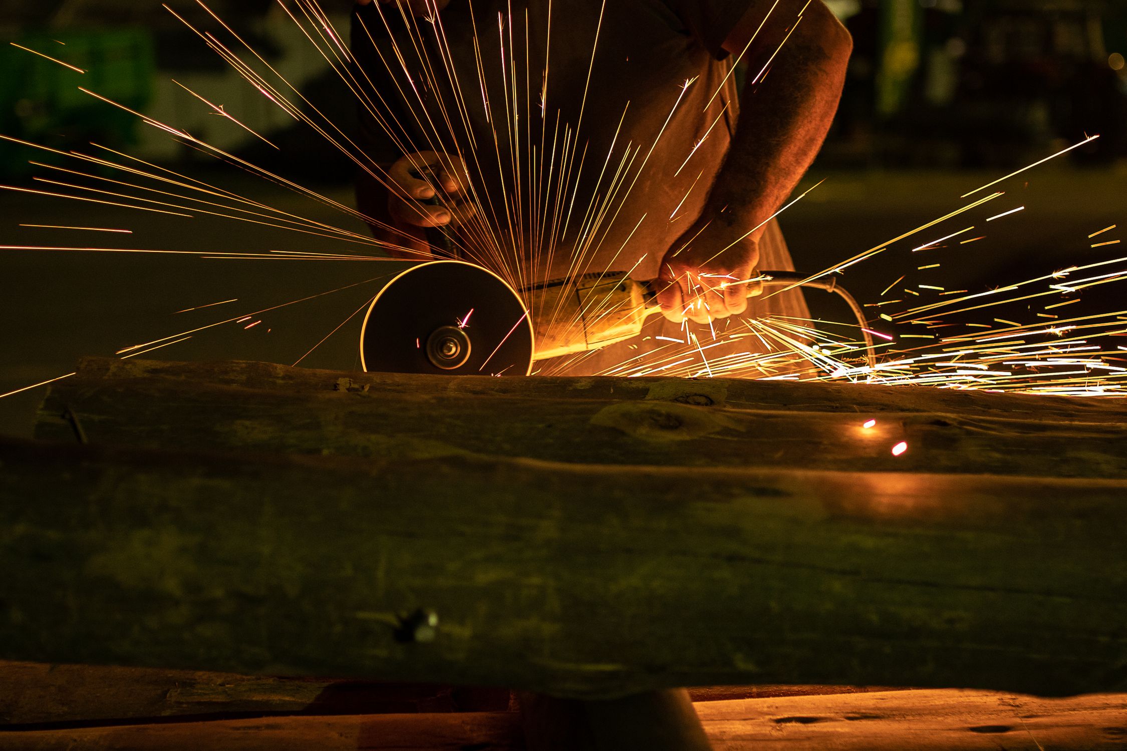 Person Using a Grinder · Free Stock Photo