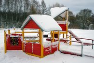 Brown Wooden House Covered With Snow