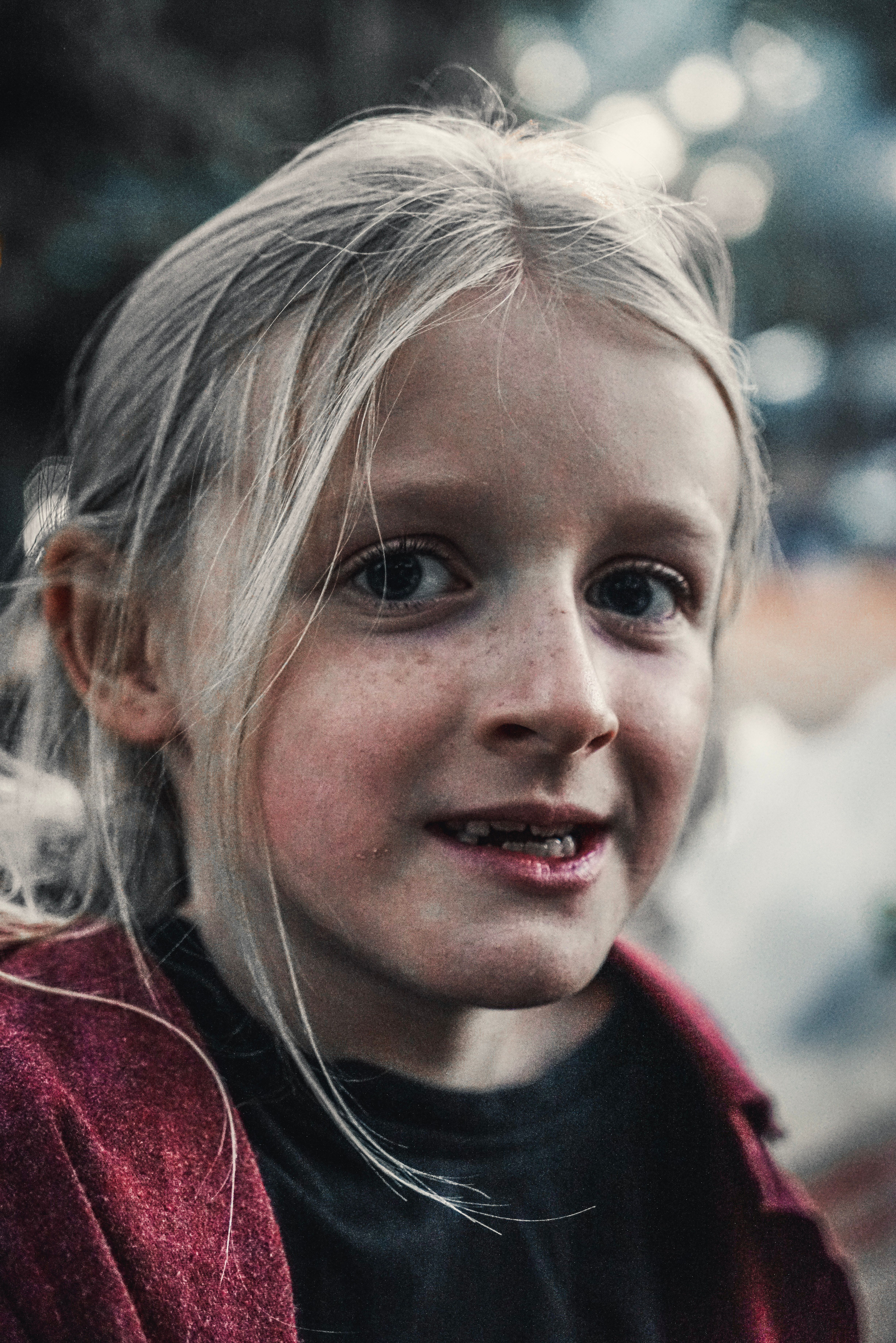 Portrait of a Smiling Girl Outdoors · Free Stock Photo