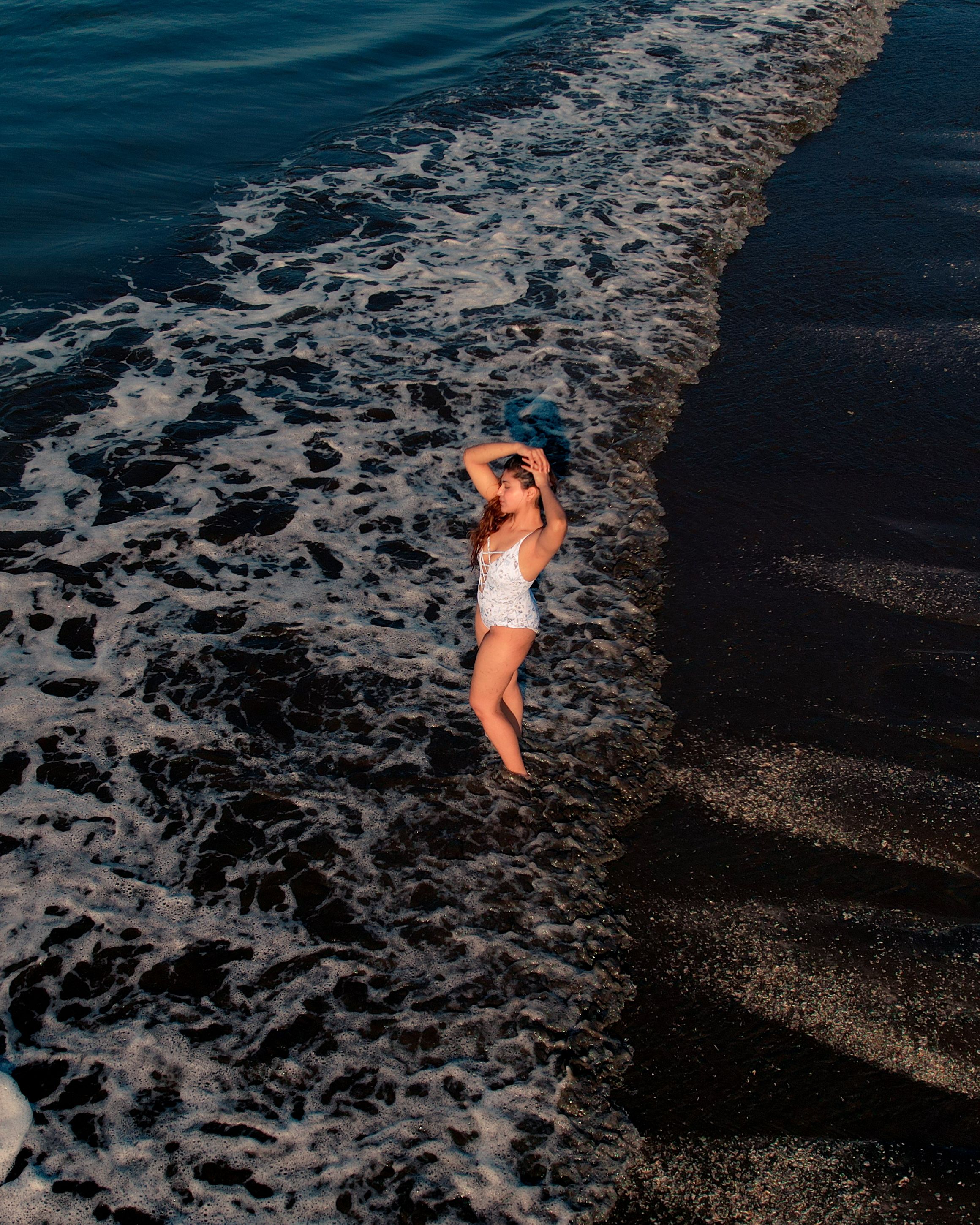 Woman Enjoying the Waves on a Mumbai Beach · Free Stock Photo