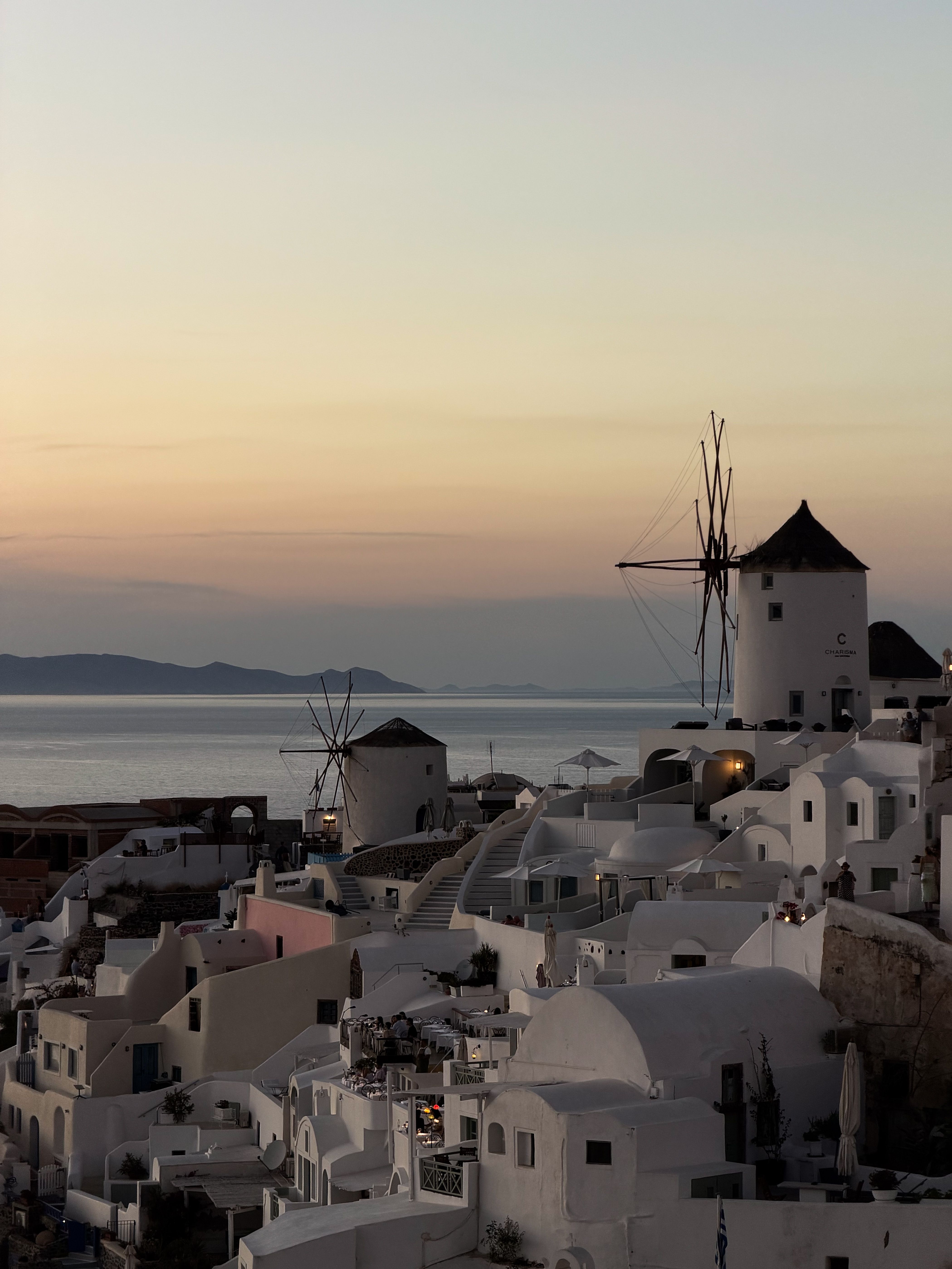 Sunset View of Oia Windmills in Santorini, Greece · Free Stock Photo