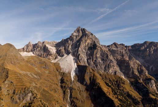 Stunning aerial view of the Dolomites in Trentino-Alto Adige during fall with vibrant autumn colors.