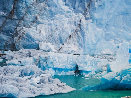 Free Stunning view of a glacier and iceberg in Patagonia with turquoise waters, depicting winter's chill. Stock Photo