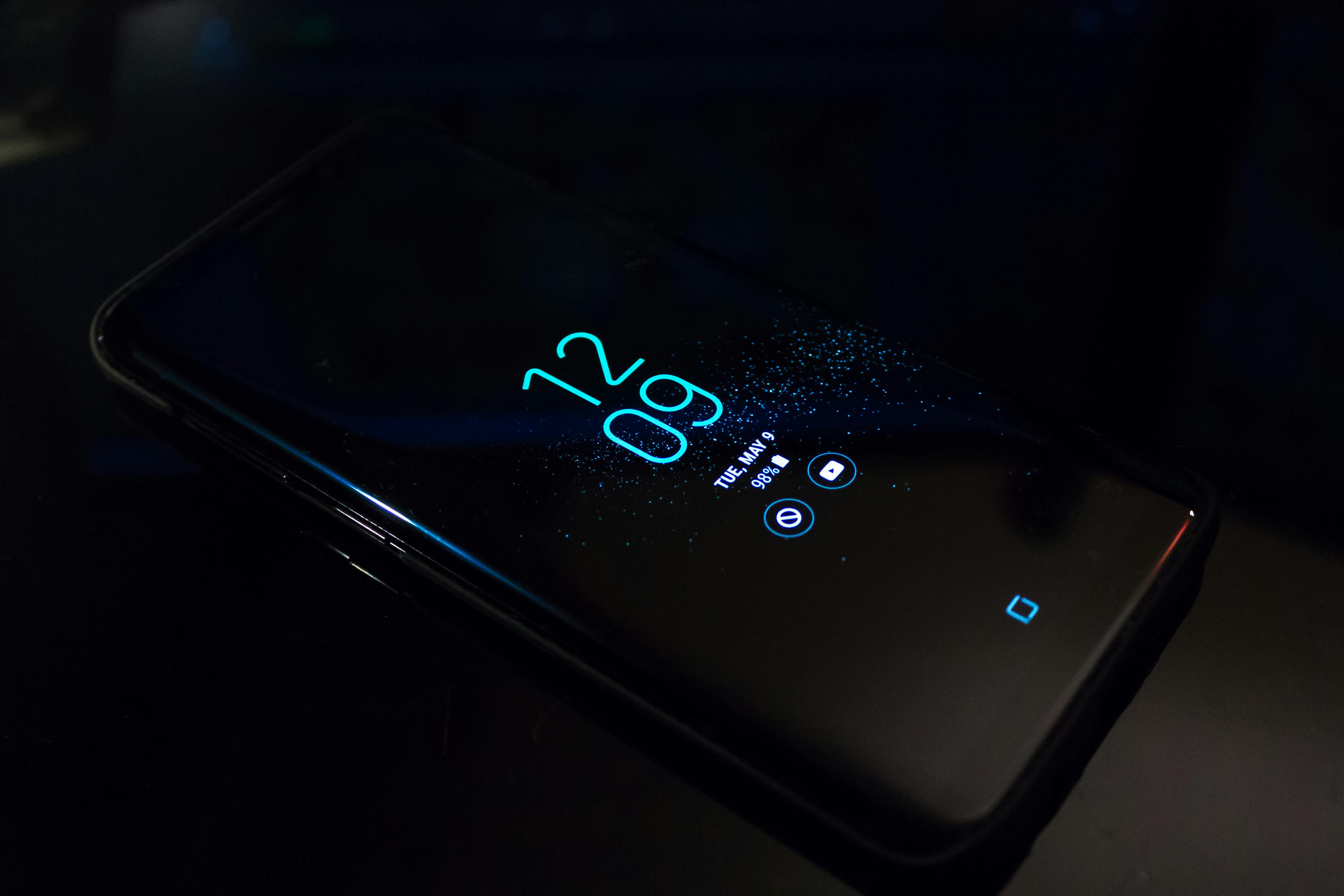 Turned-on Black Samsung Android Smartphone Displaying Clock at 12:09 · Free  Stock Photo