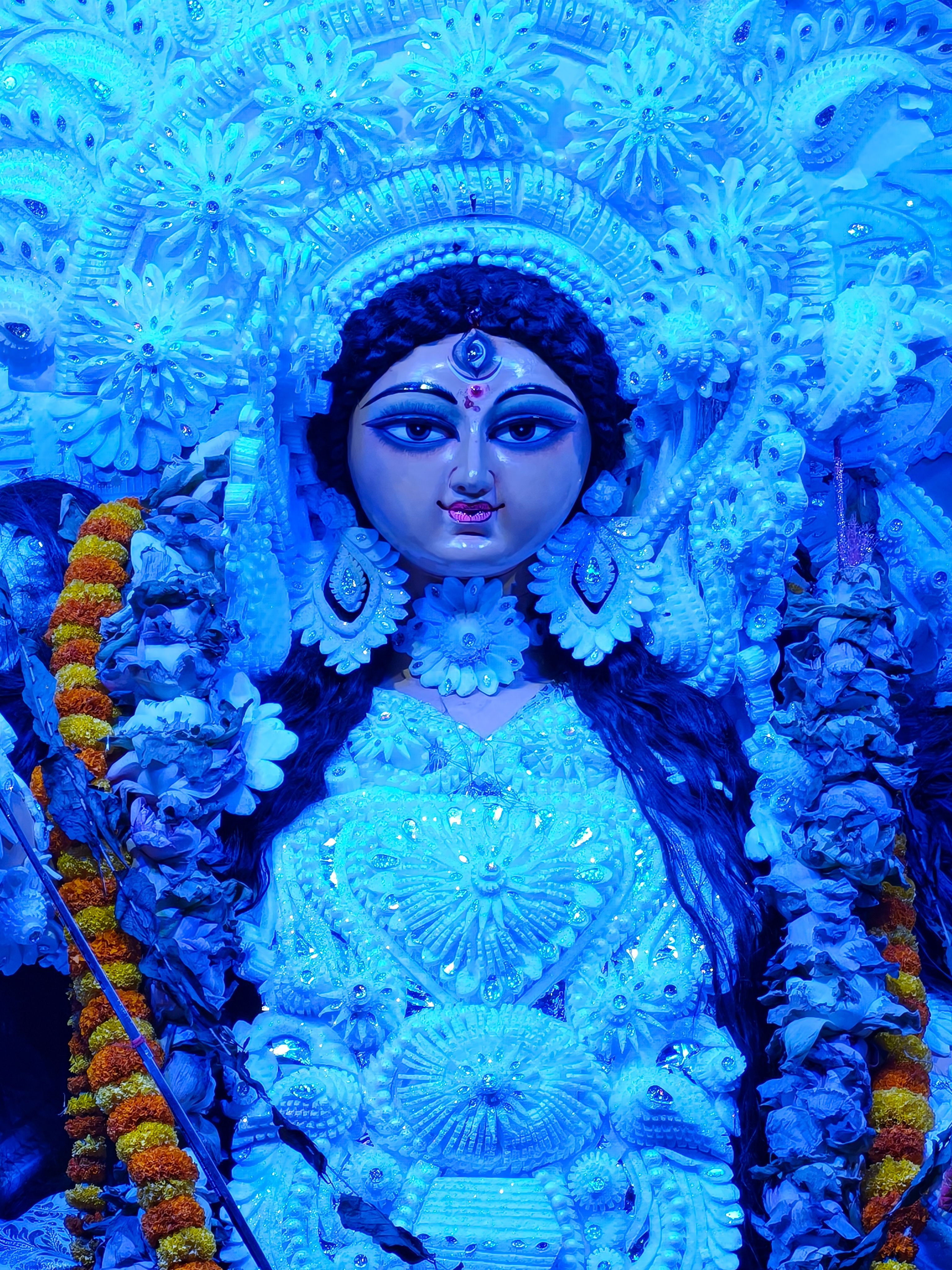 Intricate Goddess Idol with Floral Adornments · Free Stock Photo