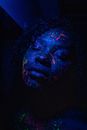 Person With Red and Blue Face Paint