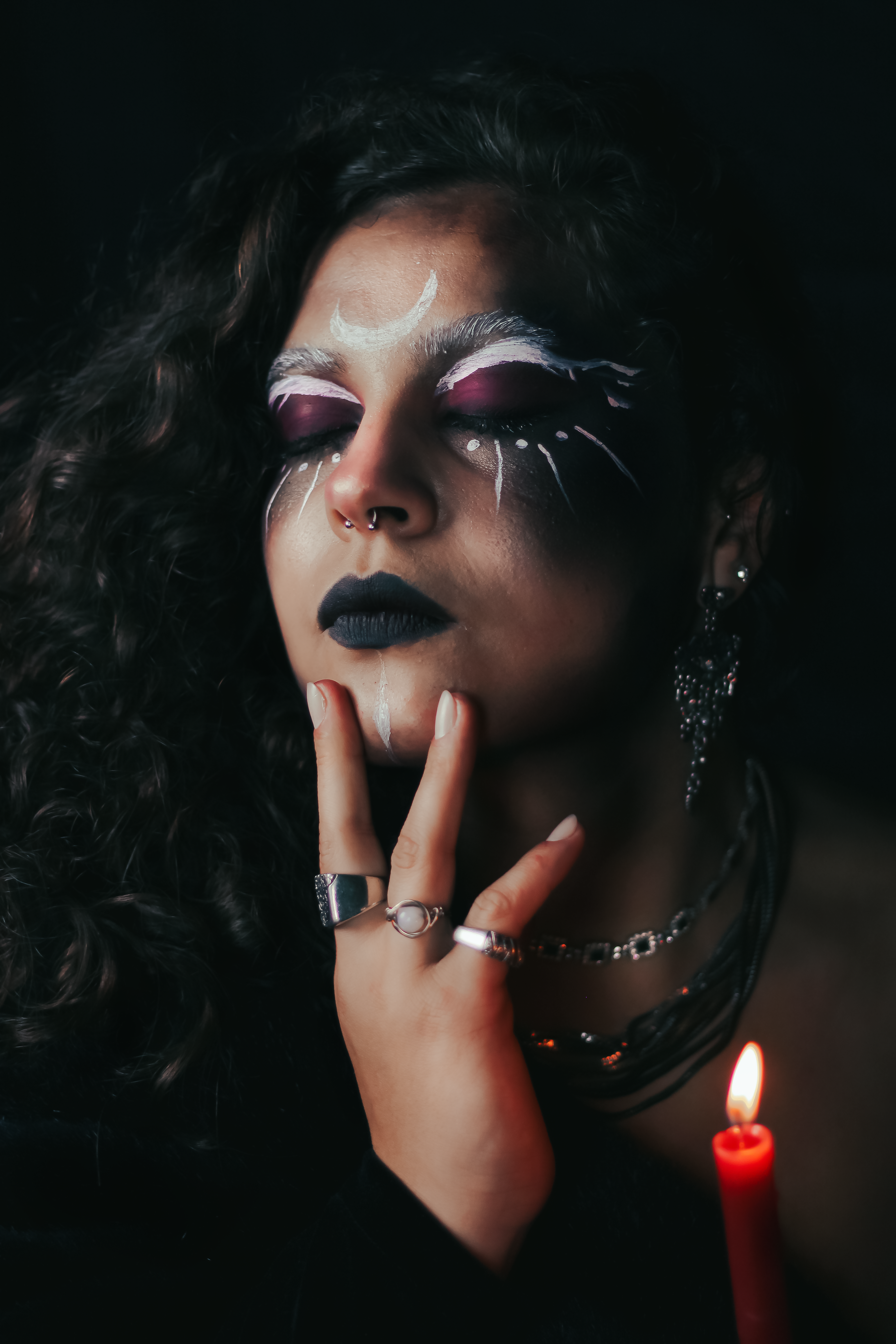 Enchanting Gothic Makeup with Candlelit Atmosphere · Free Stock Photo