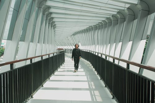 Man walking on a Footbridge 