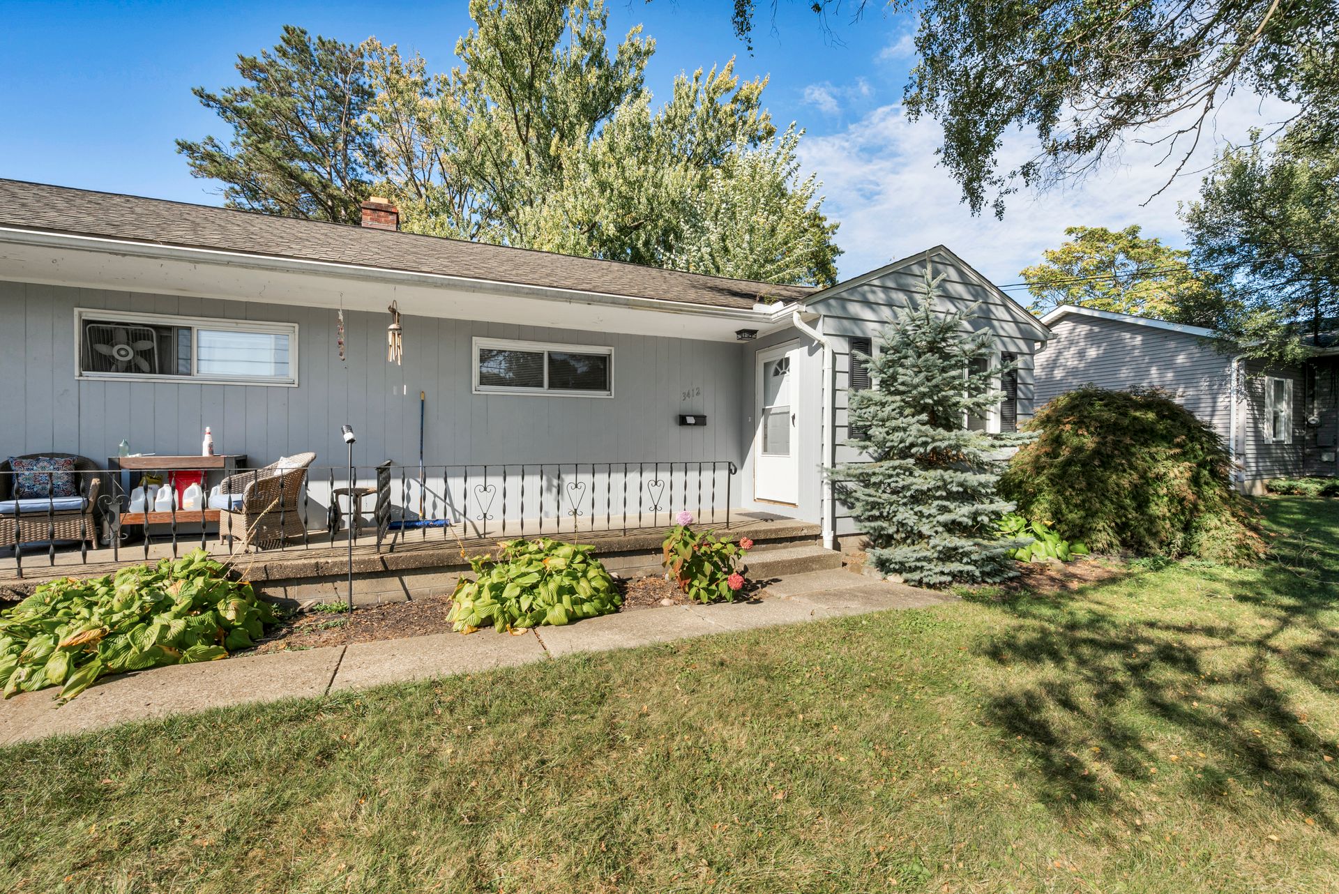 Ranch-style starter home with a small front porch