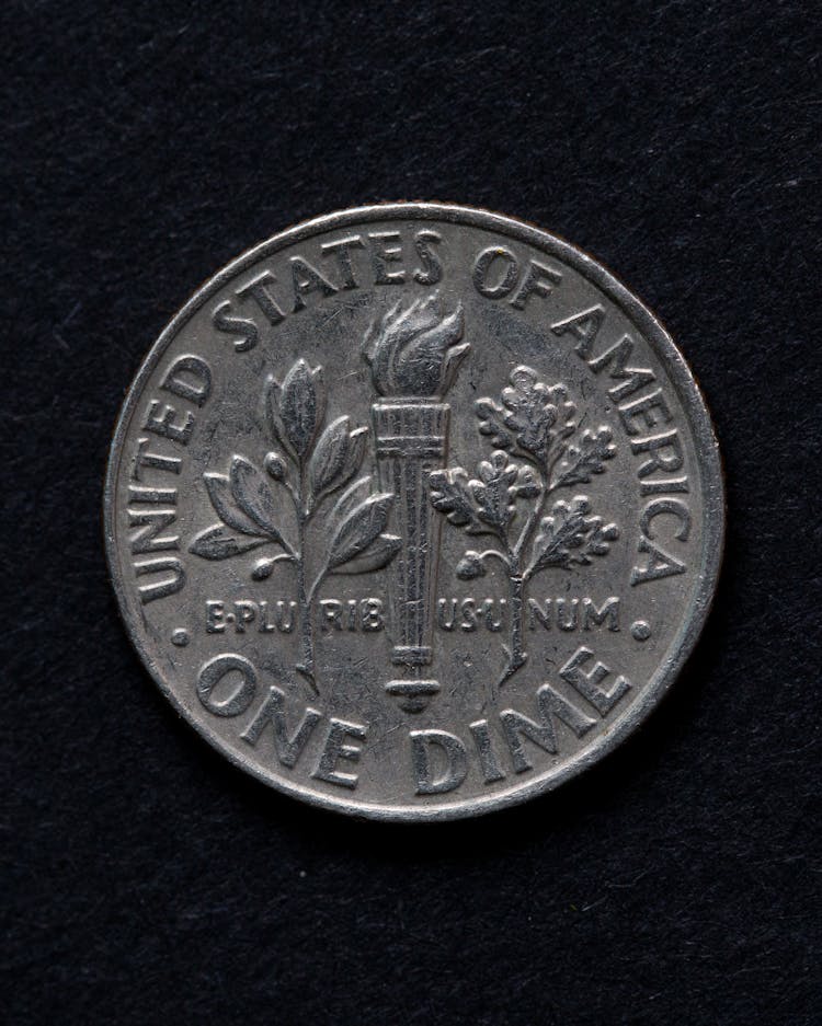 Silver Dime Coin On Black Background