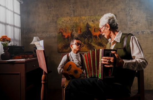 A grandfather teaching his grandson music with an accordion and guitar indoors, exuding warmth and tradition.
