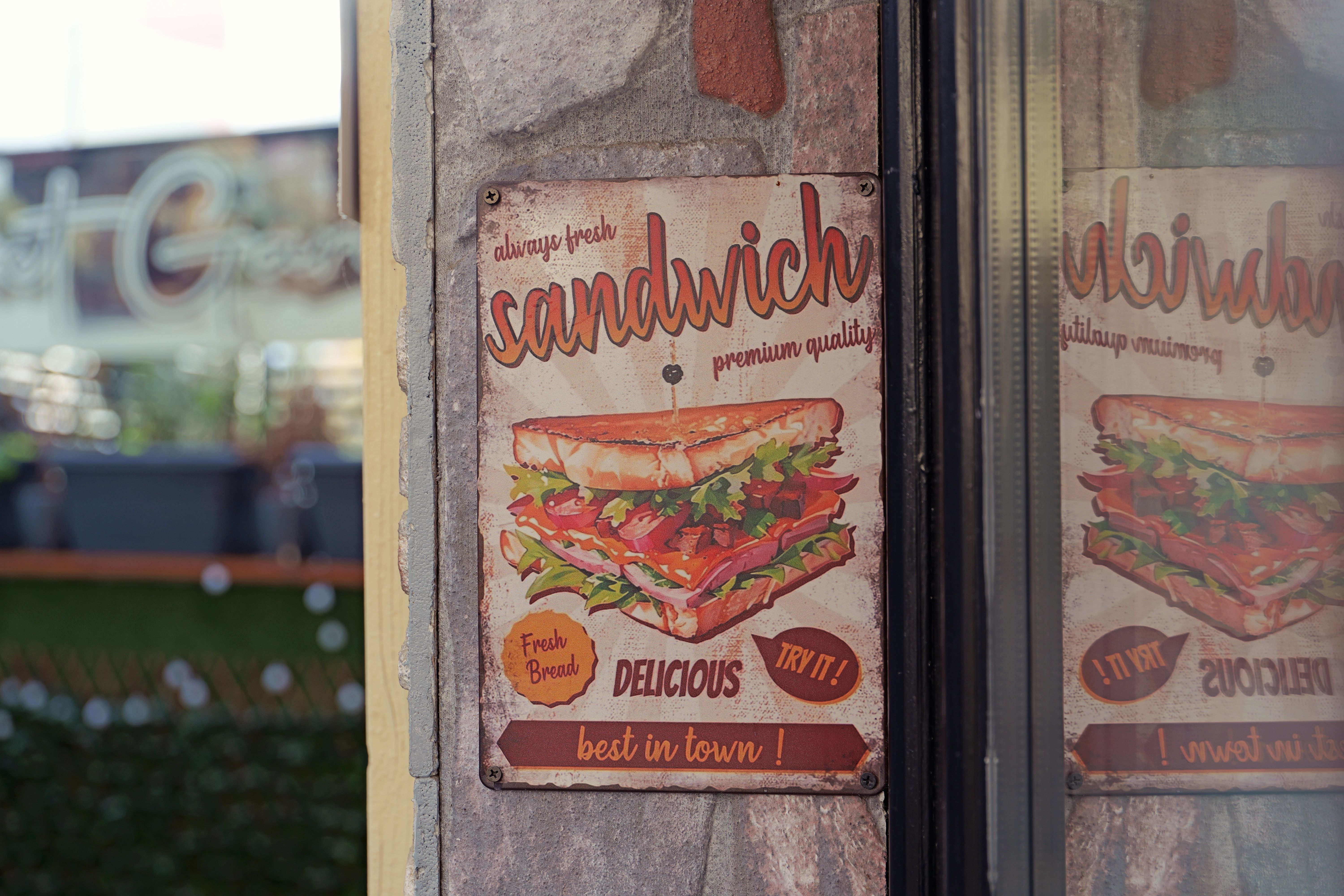 Retro Sandwich Shop Sign with Reflection · Free Stock Photo