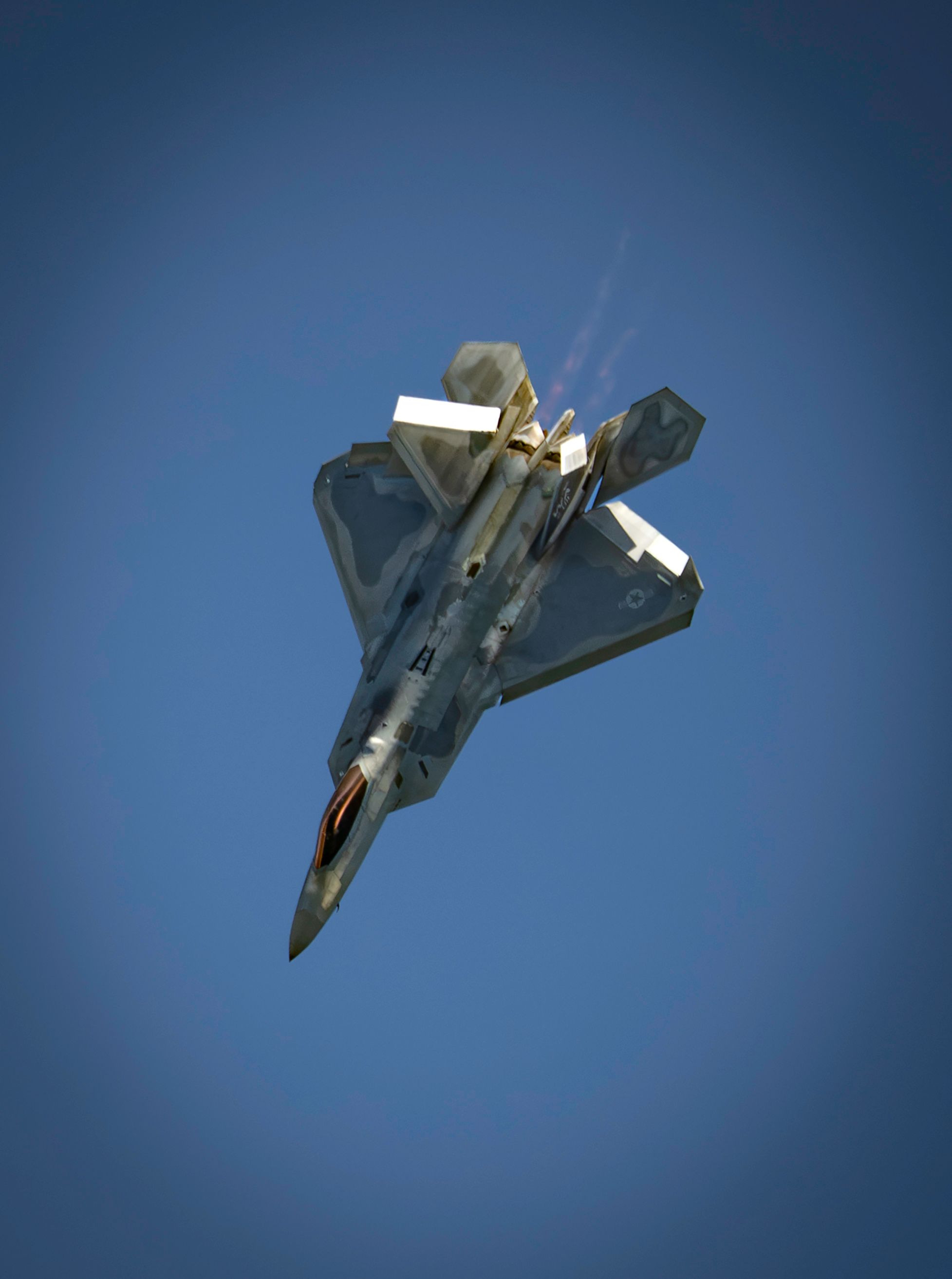 Dynamic Flight of a Military Fighter Jet · Free Stock Photo