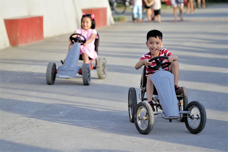 Kid Riding Go Karts On The Street