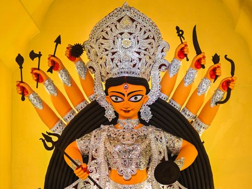 Free Stunning portrayal of Maa Durga idol at a festival in Kolkata, highlighting Hindu culture. Stock Photo