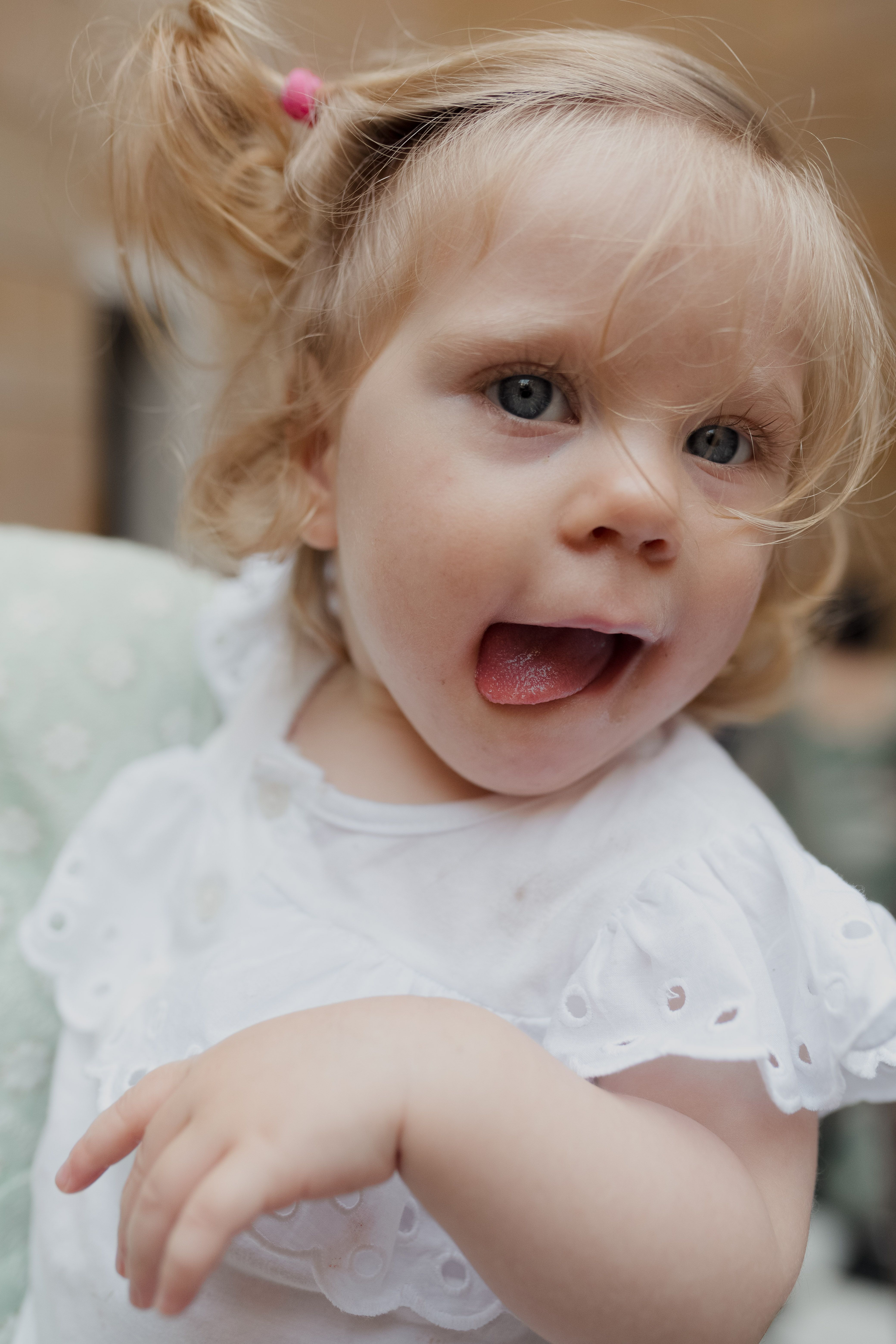 Adorable Baby Girl Making a Funny Face · Free Stock Photo
