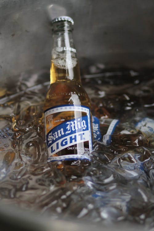 Free Beer Bottle in a Bucket of Ice Stock Photo