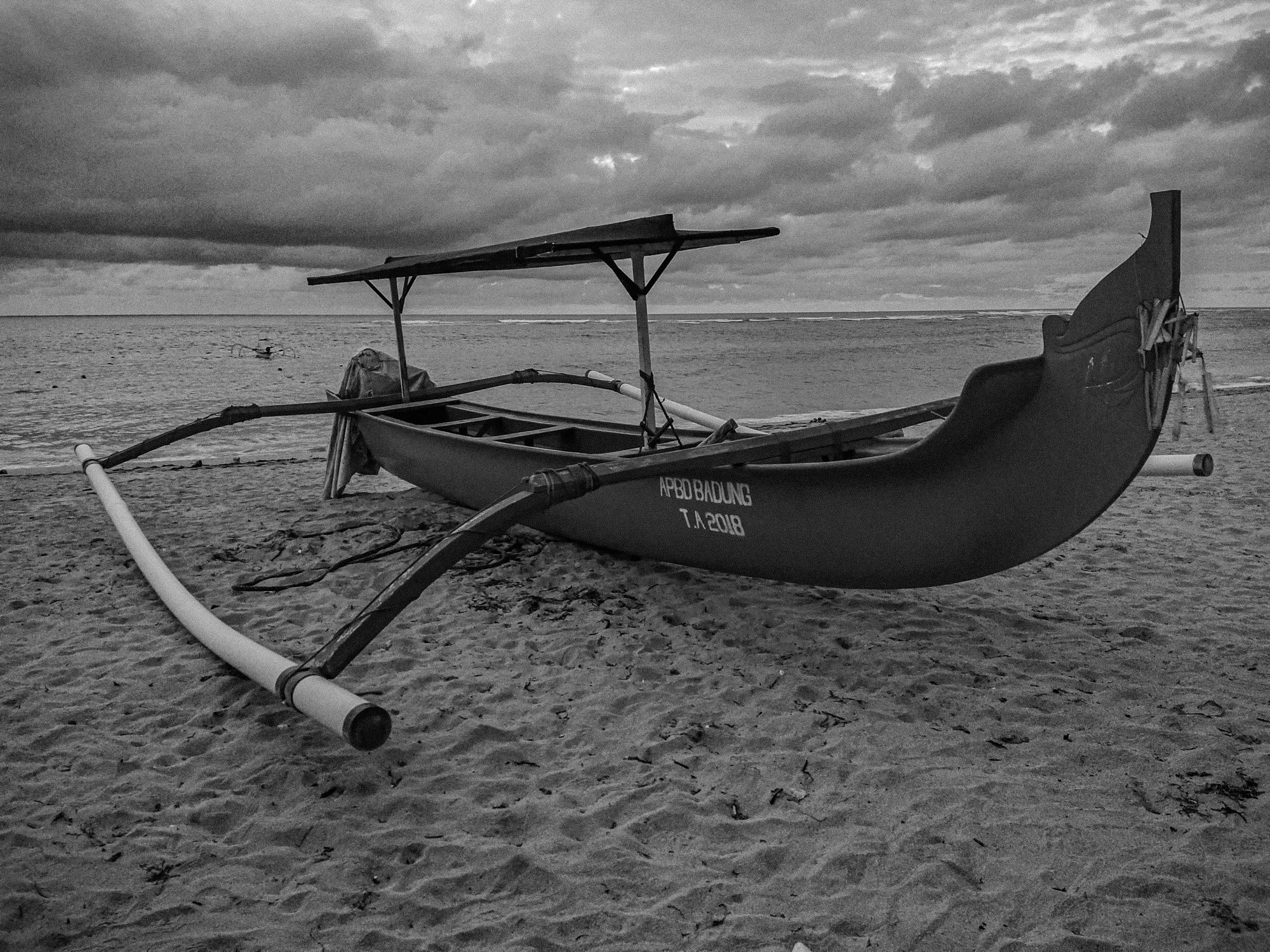 Beach Boats Ride Traditional Outrigger Boat on Tropical Beach · Free Stock Photo