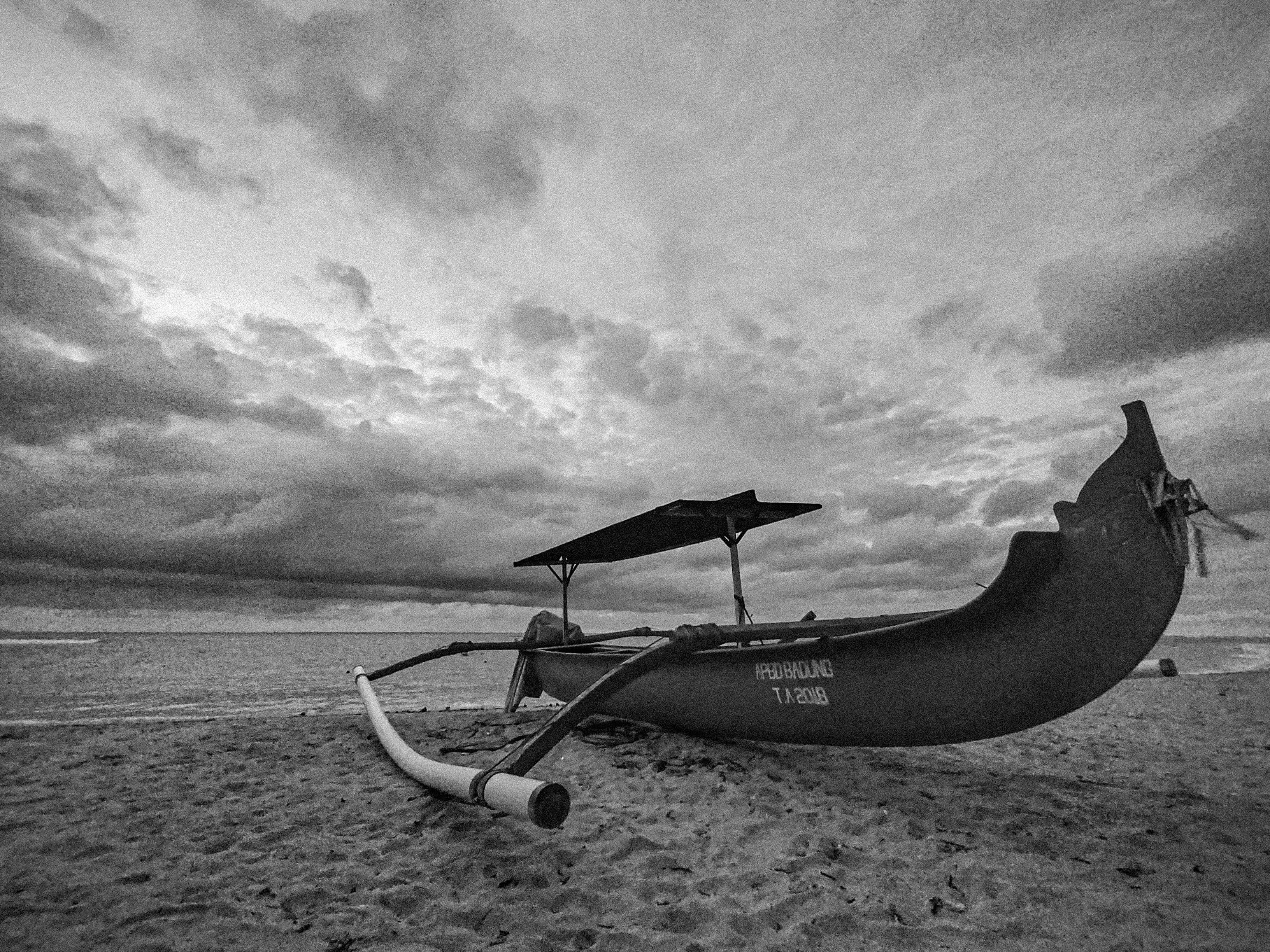Traditional Fishing Boat on Beach at Twilight · Free Stock Photo