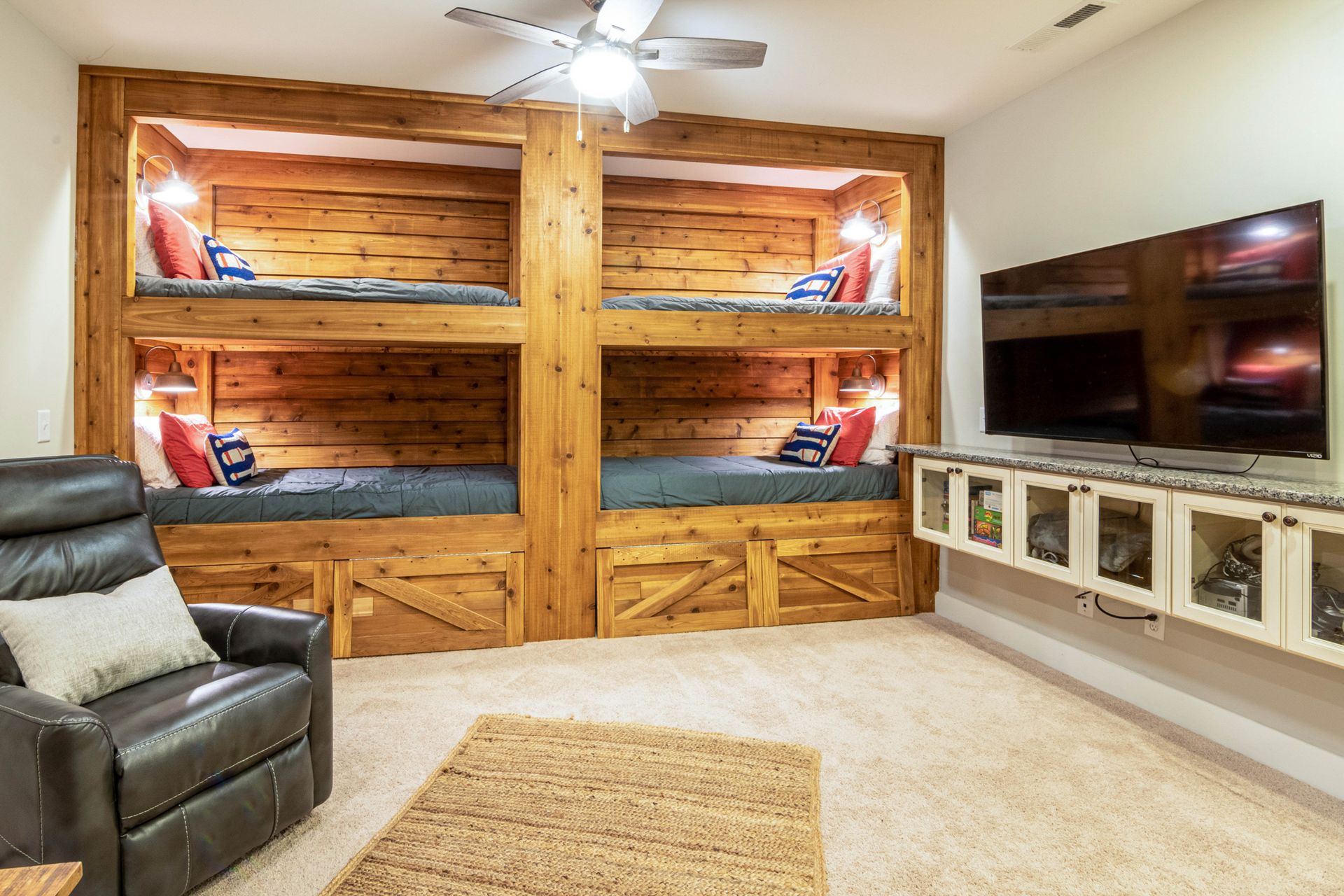 Wooden Beds in Room with TV