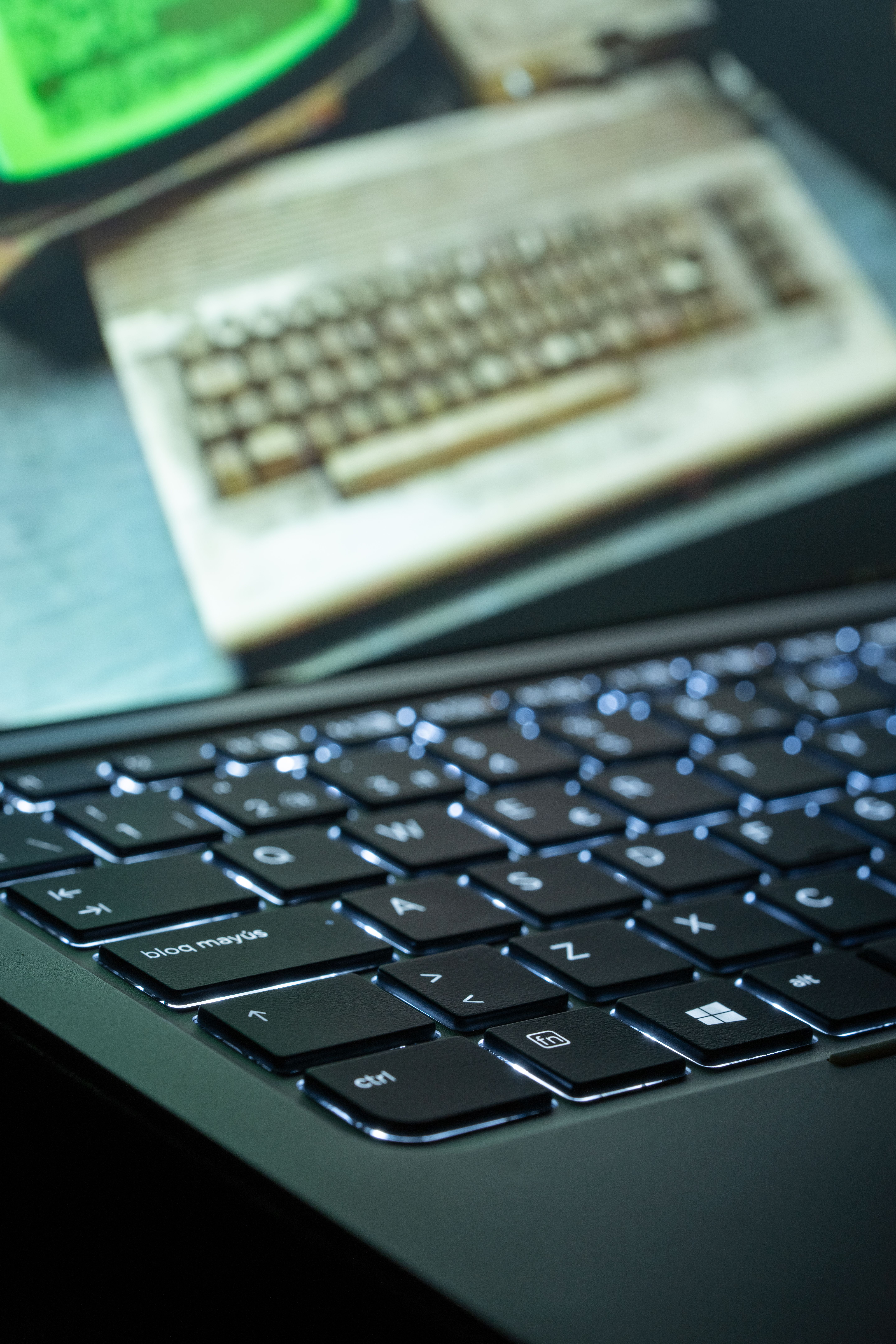 Modern Laptop Keyboard vs Retro Computer · Free Stock Photo
