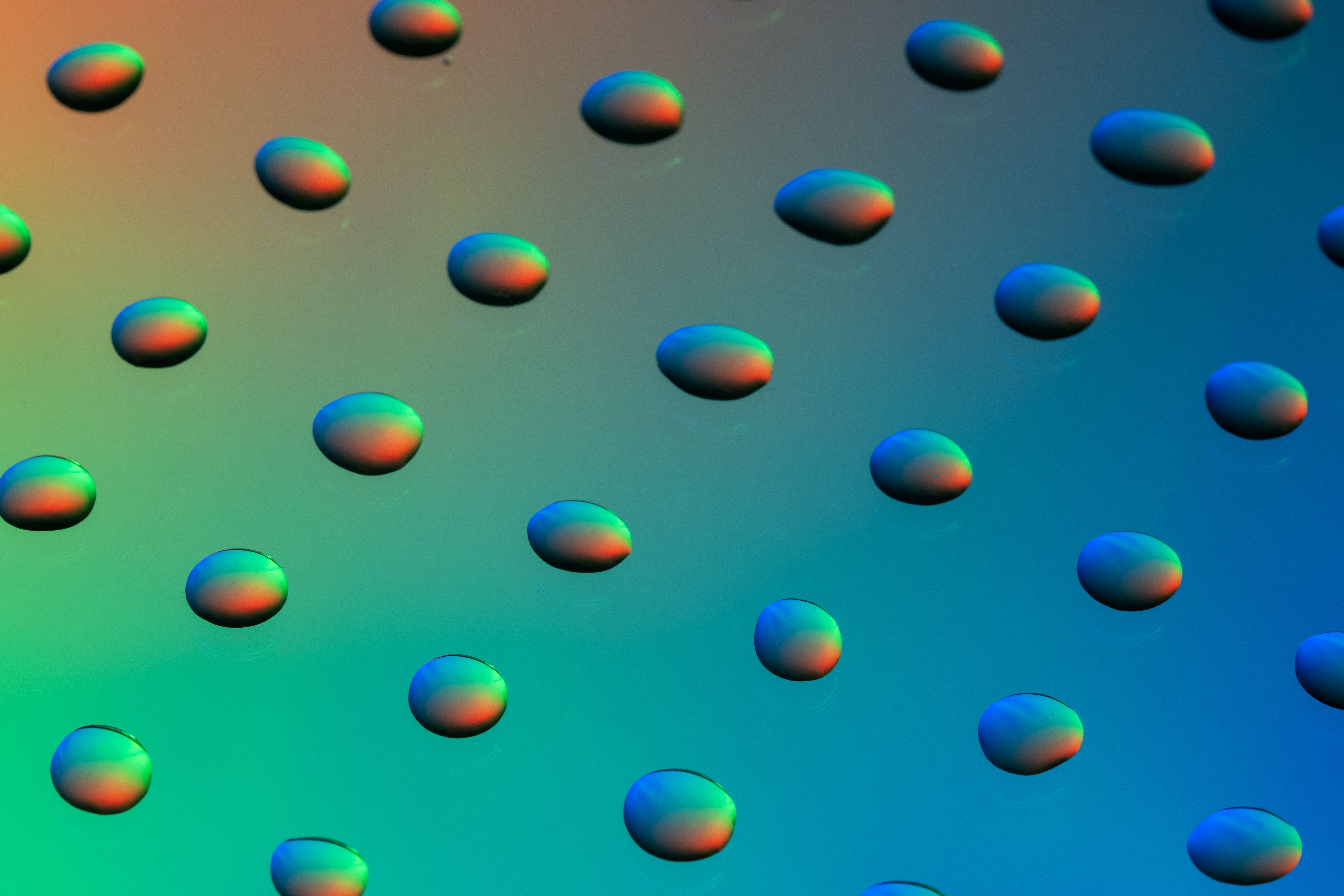 Colorful Water Droplets on Gradient Background · Free Stock Photo