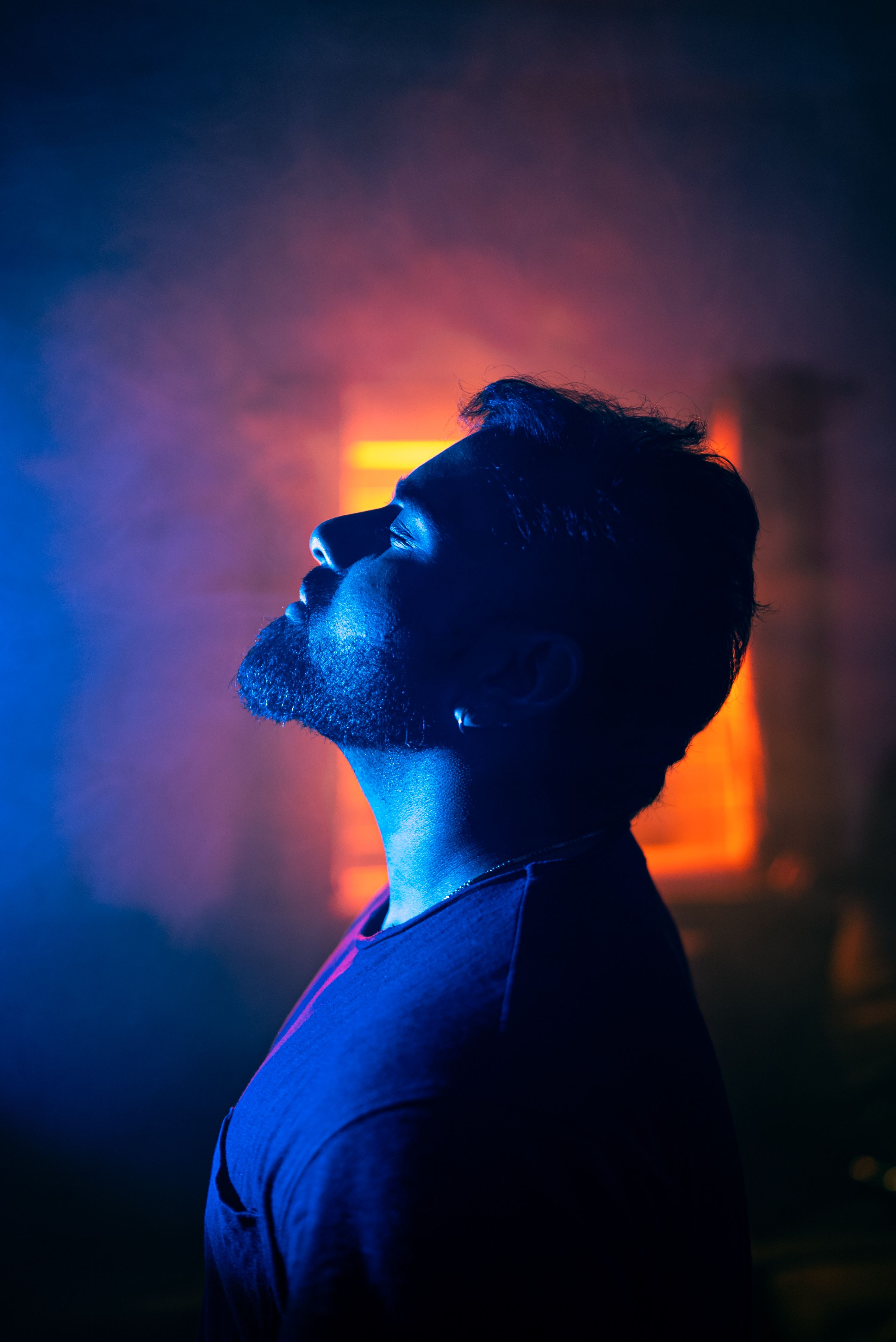 Dramatic Male Silhouette in Vibrant Lighting · Free Stock Photo