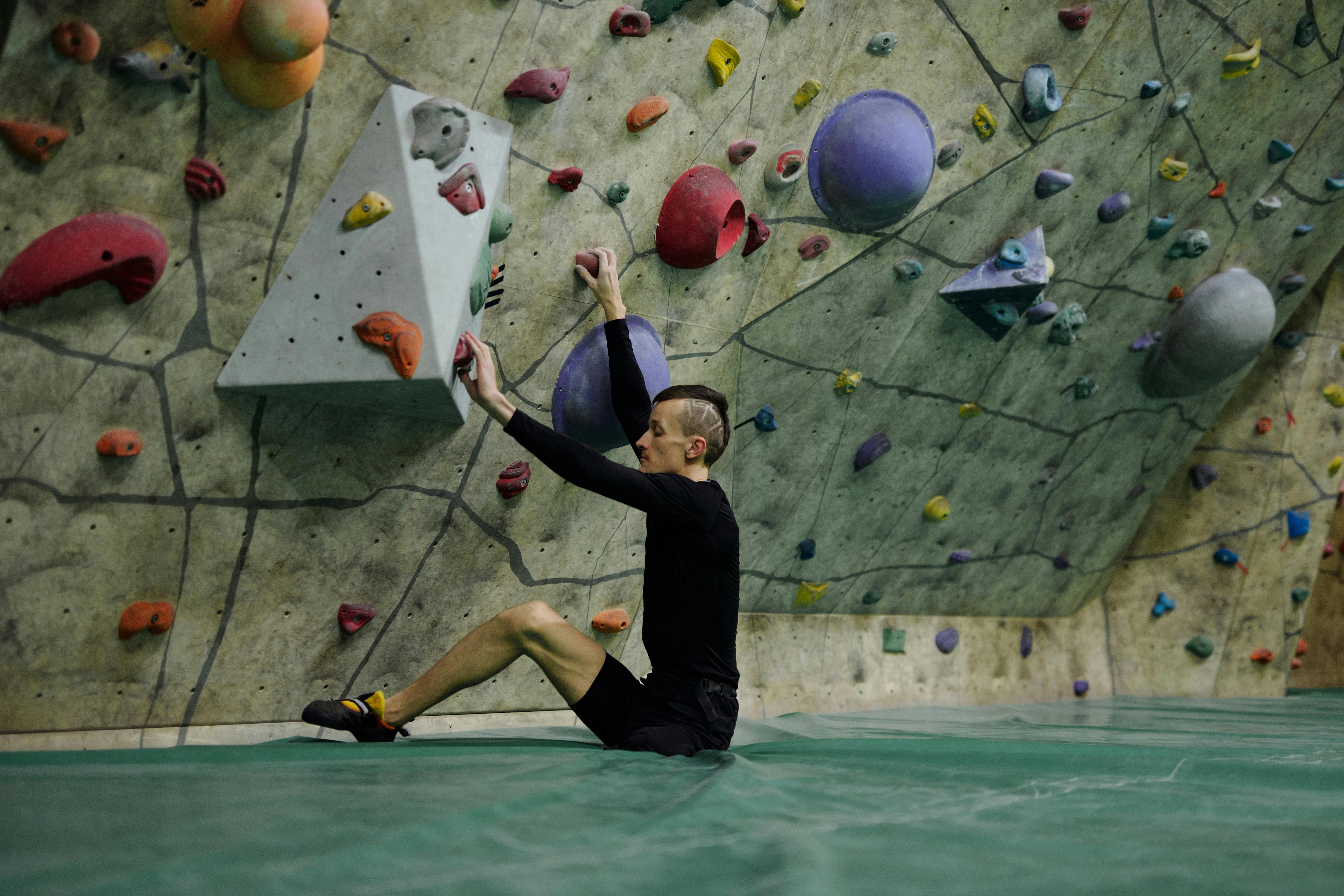 Man Climbing Wall