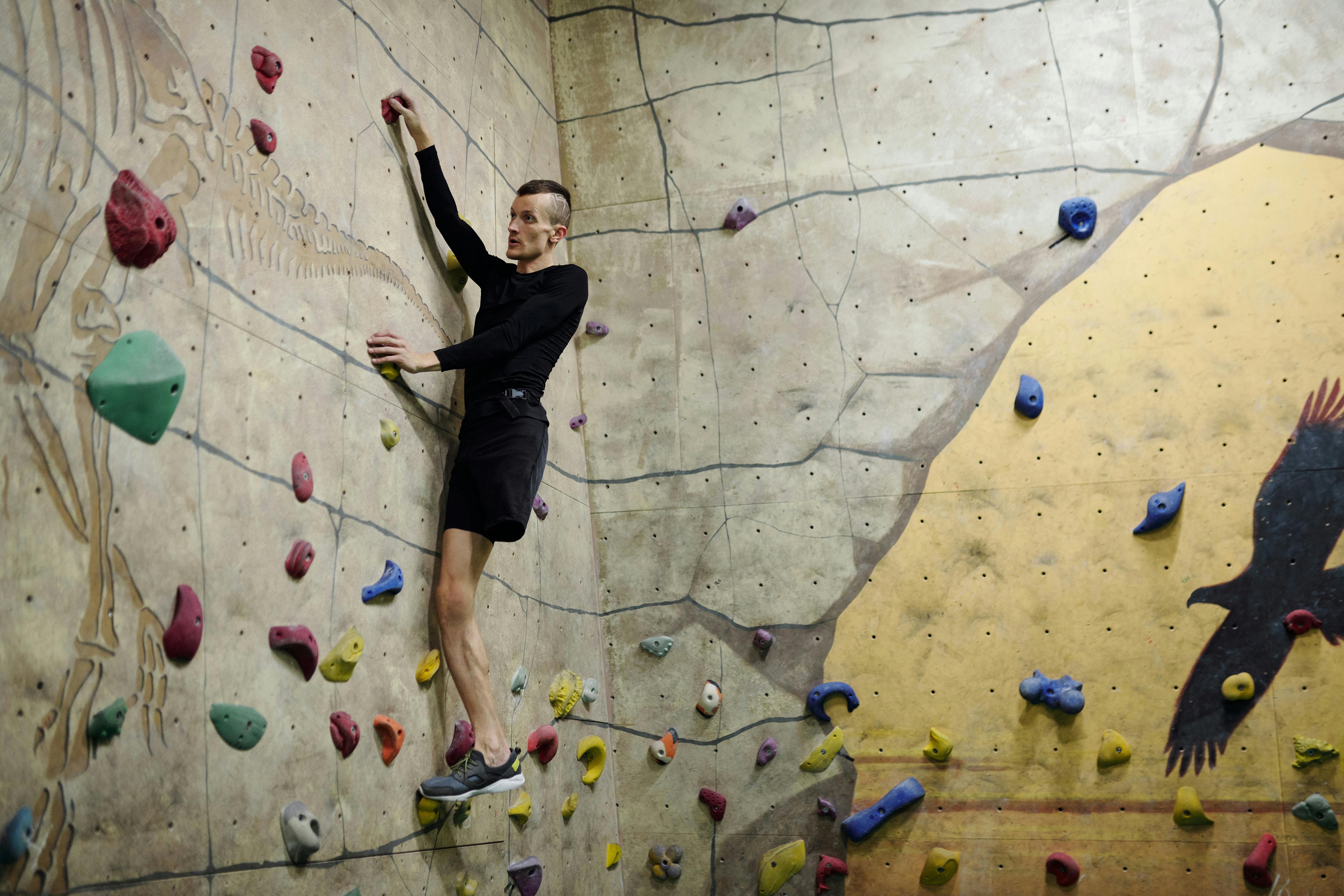 Man Climbing Wall