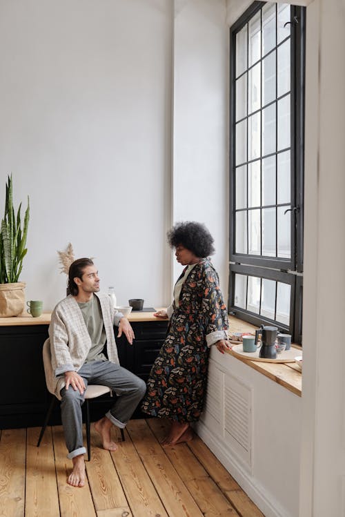 Free Multiethnic Couple Talking Stock Photo