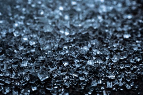 Free Abstract close-up of blue crystal texture, showcasing intricate patterns and a reflective surface. Stock Photo