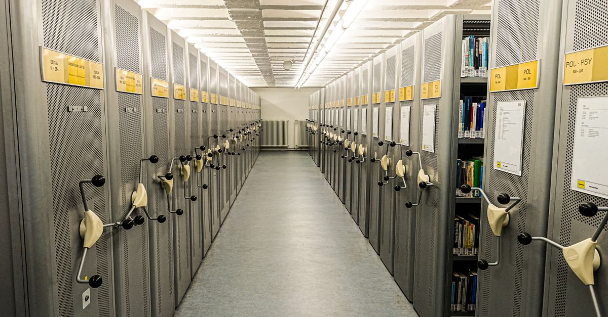 Efficient storage system and bookshelves in a Munich academic library's archive.
