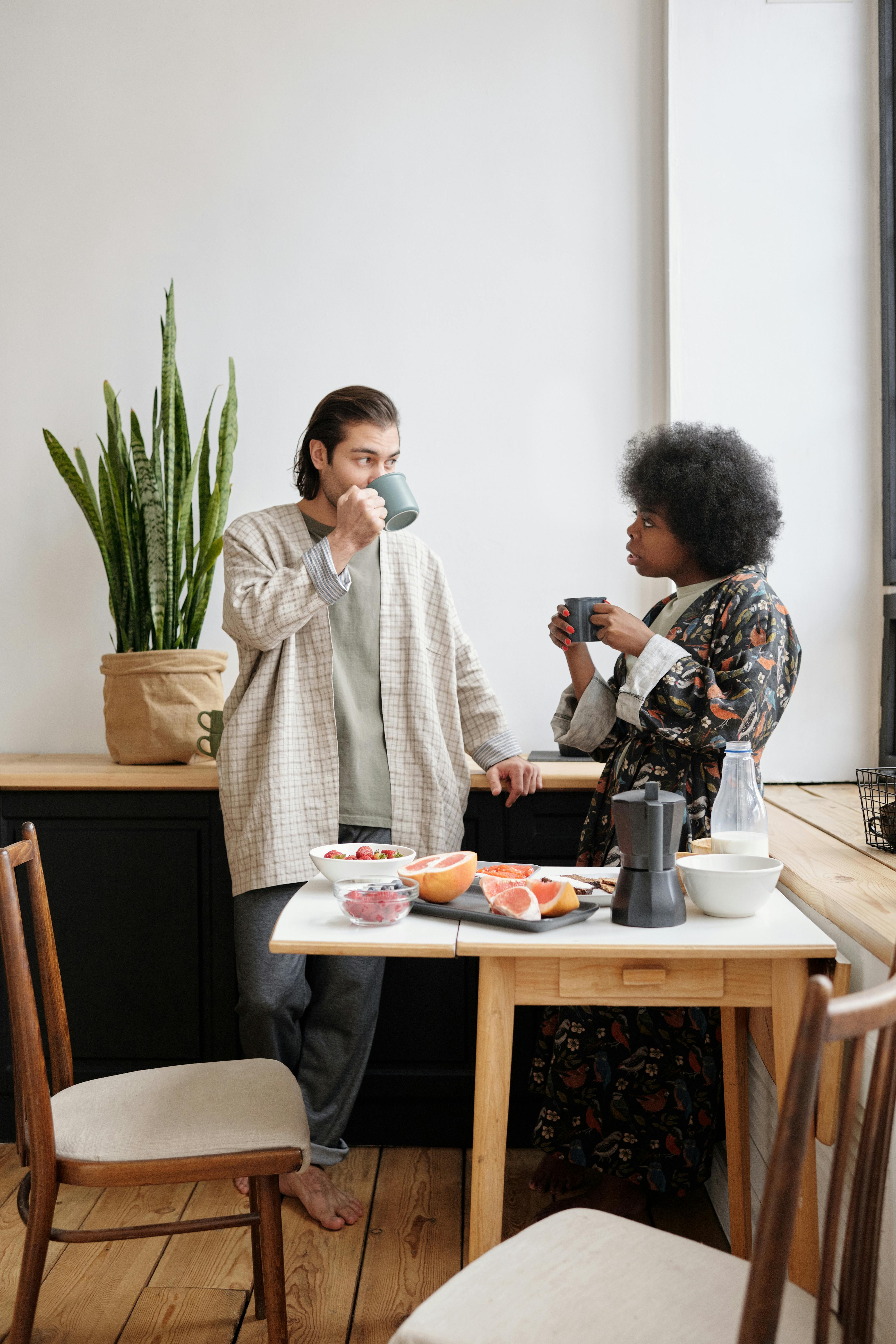 couple talking and having breakfast