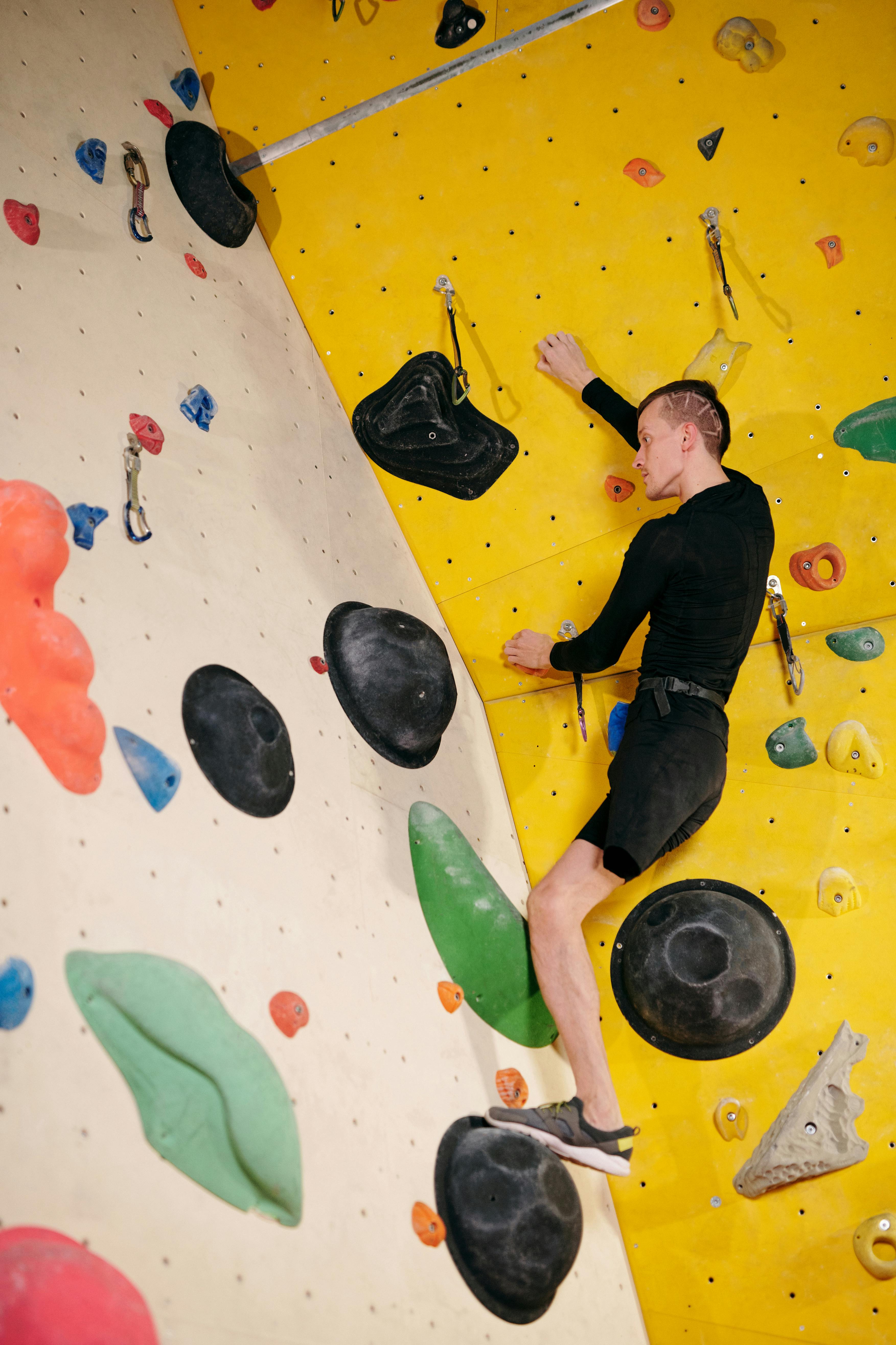 Man With Prosthetic Leg Determined To Climb A Wall · Free Stock Photo