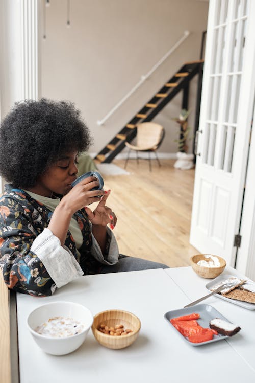 Free Woman Having Breakfast Stock Photo