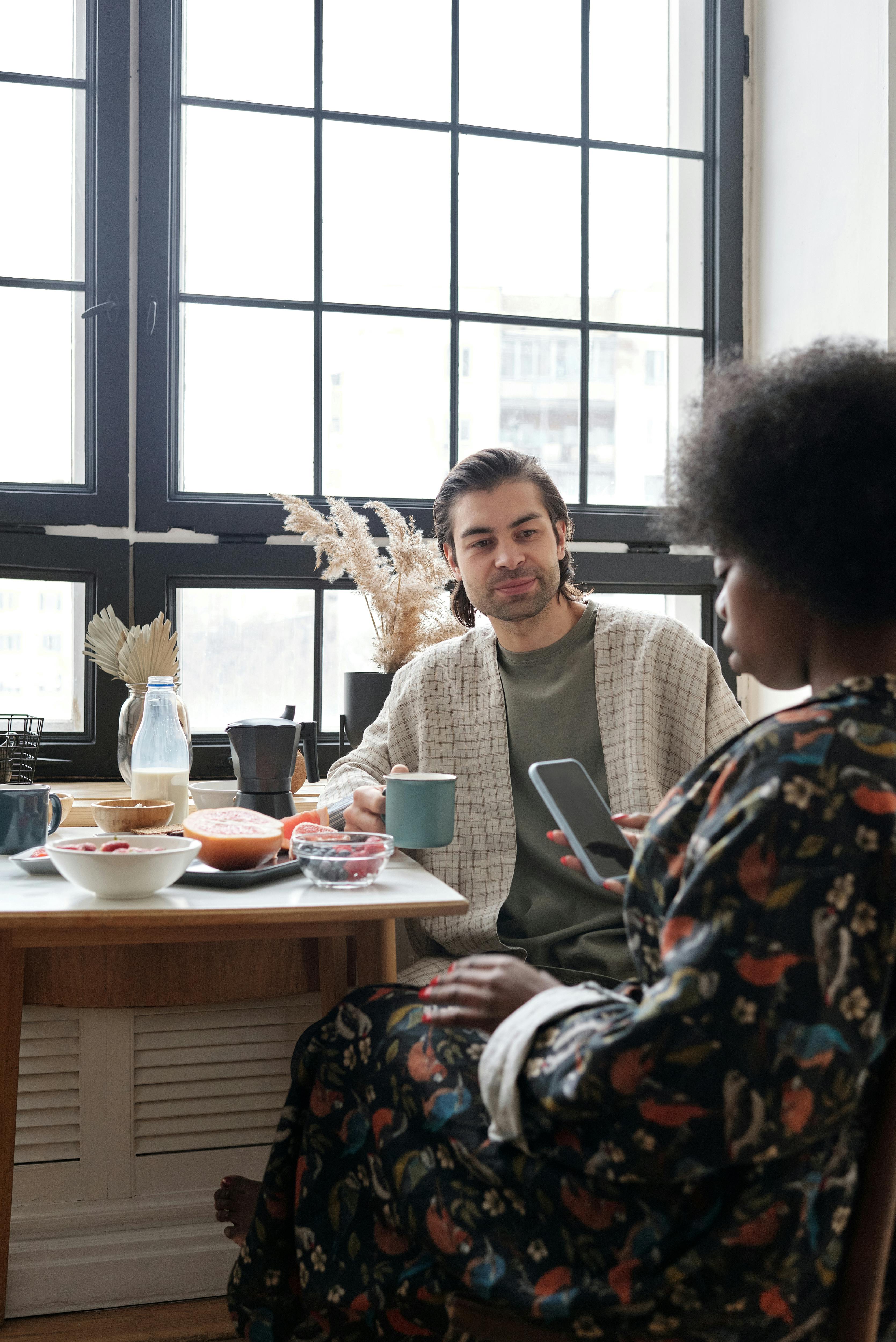 Couple Having Breakfast at Home · Free Stock Photo