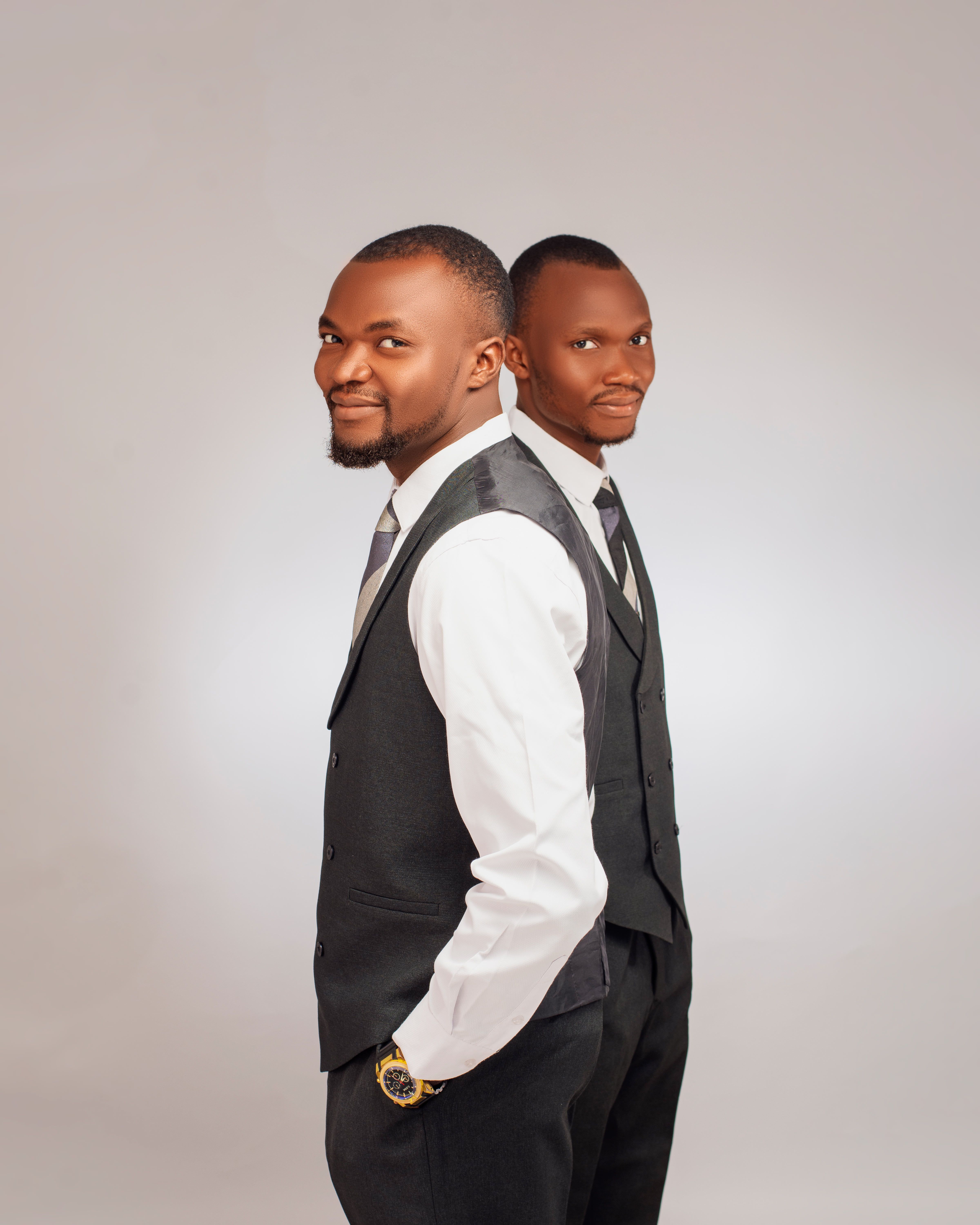 Professional Portrait of Two Men in Formal Attire · Free Stock Photo