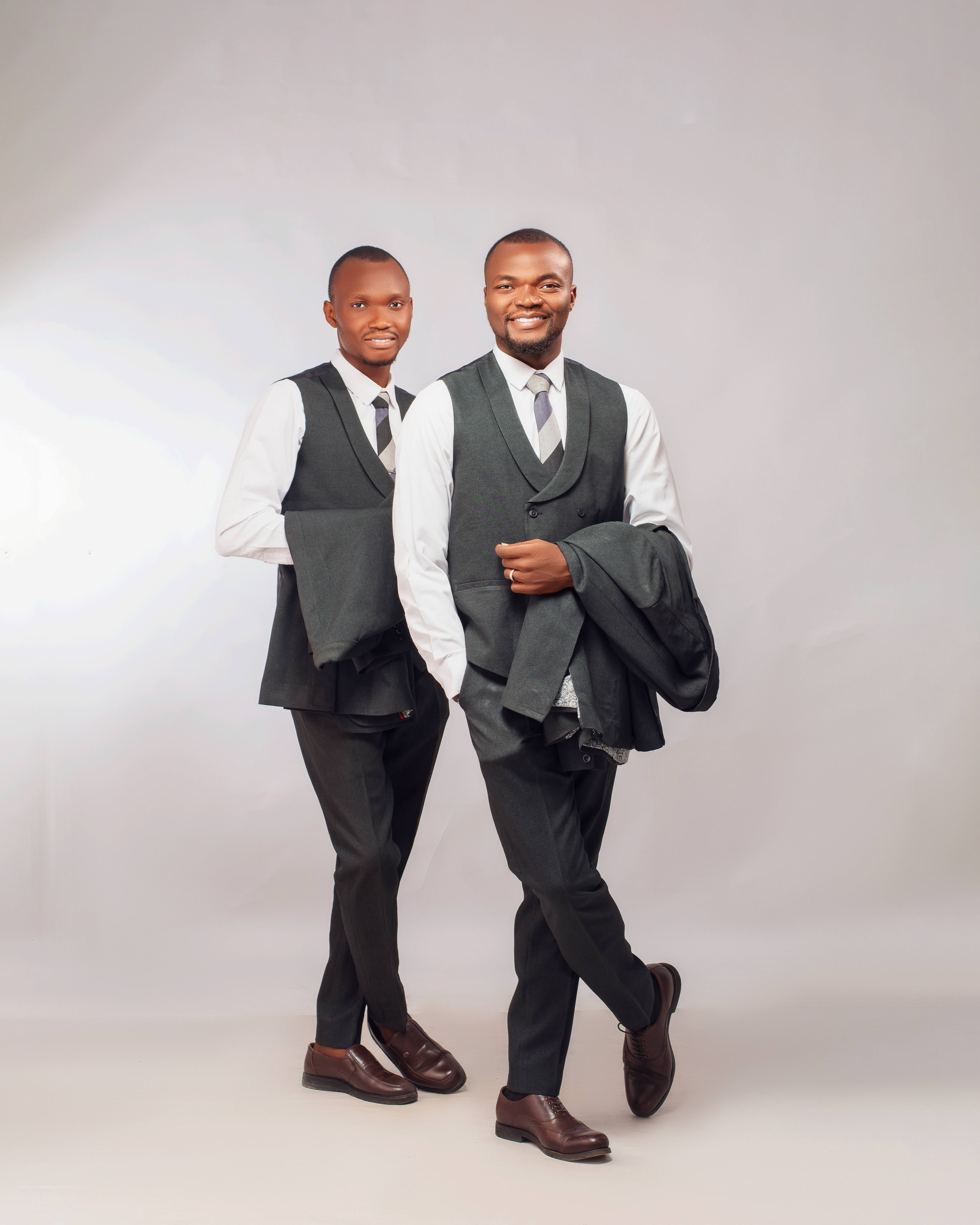 Professional Portrait of Two Men in Suits · Free Stock Photo