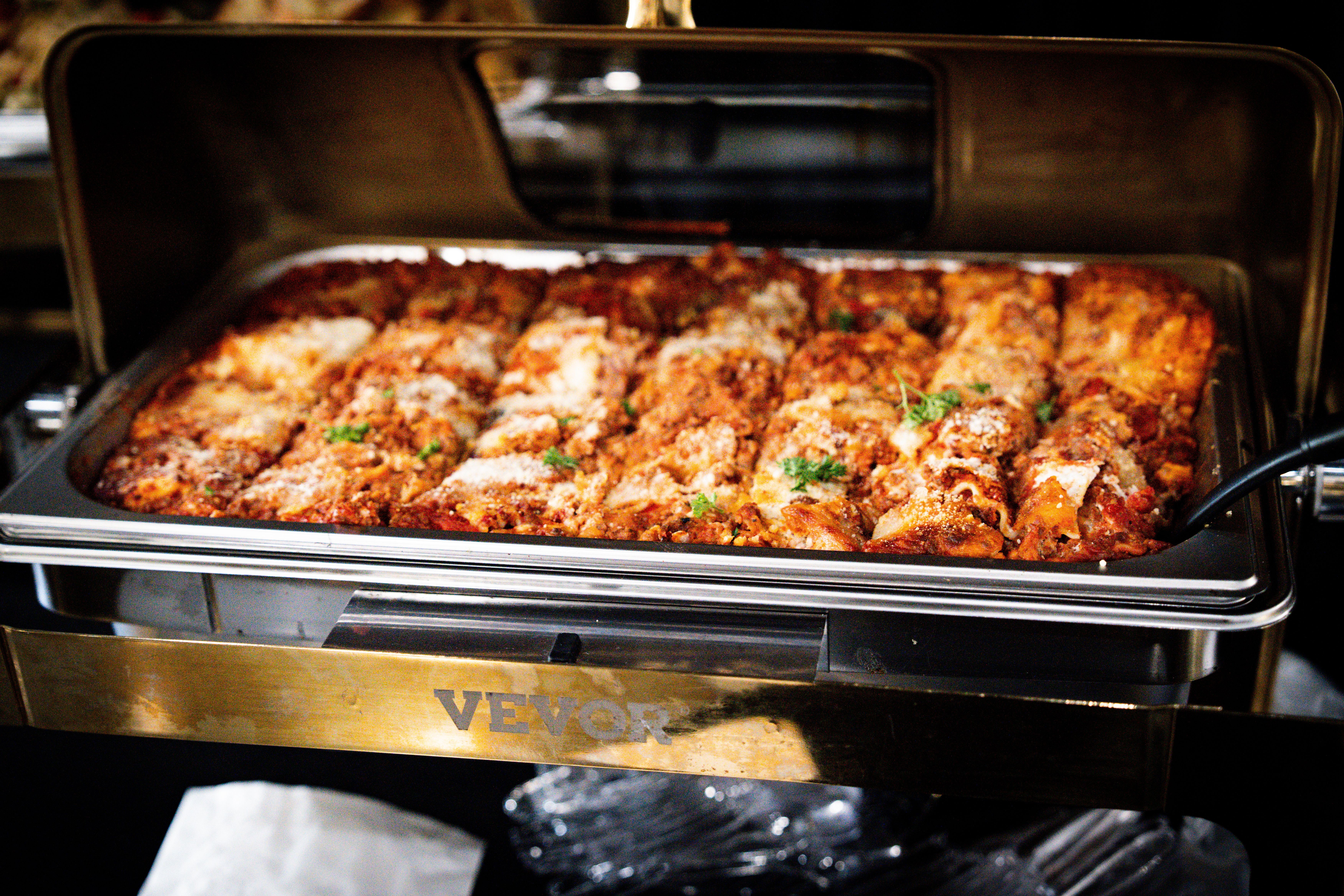 Freshly Baked Lasagna in Buffet Warmer · Free Stock Photo
