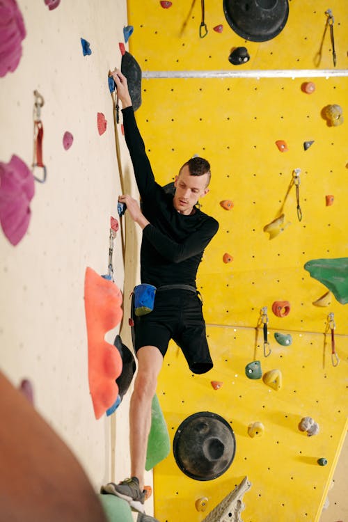 Man With Disability Doing Wall Climbing 
