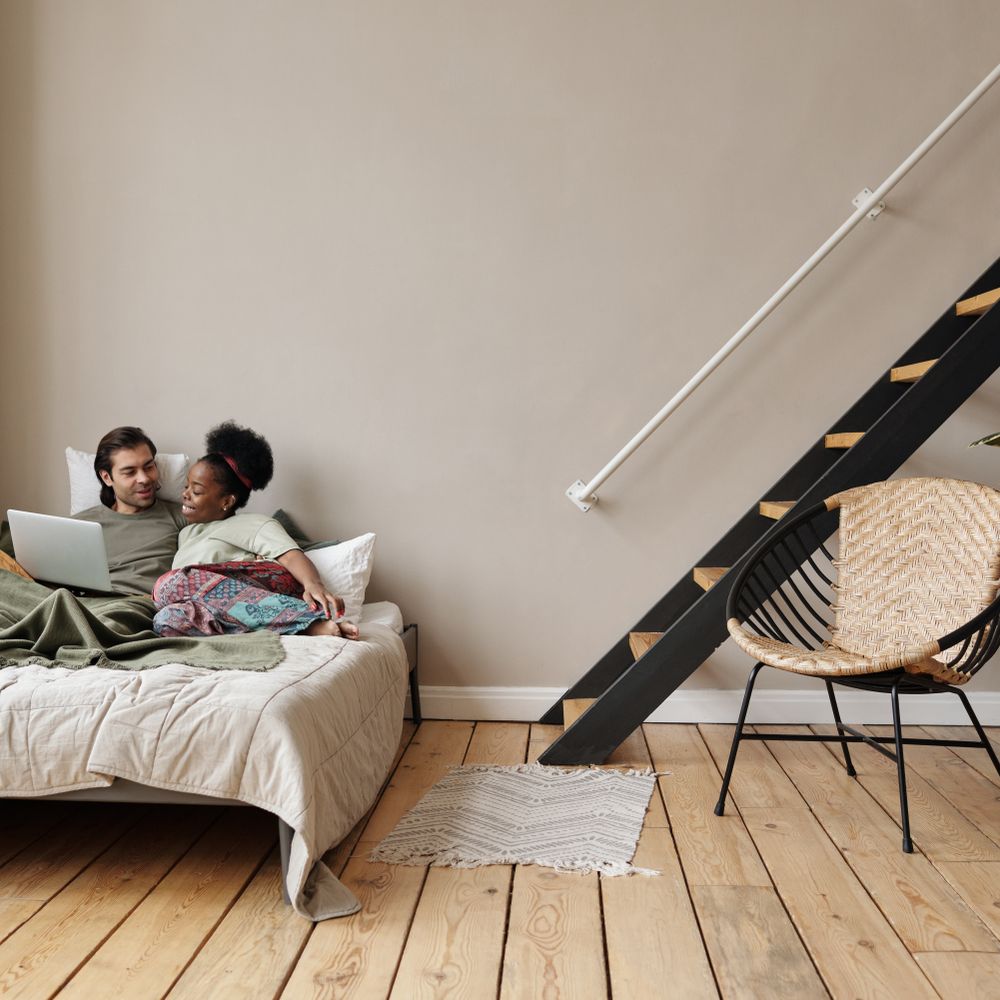 Wrangle — professional movers carrying furniture on a house move