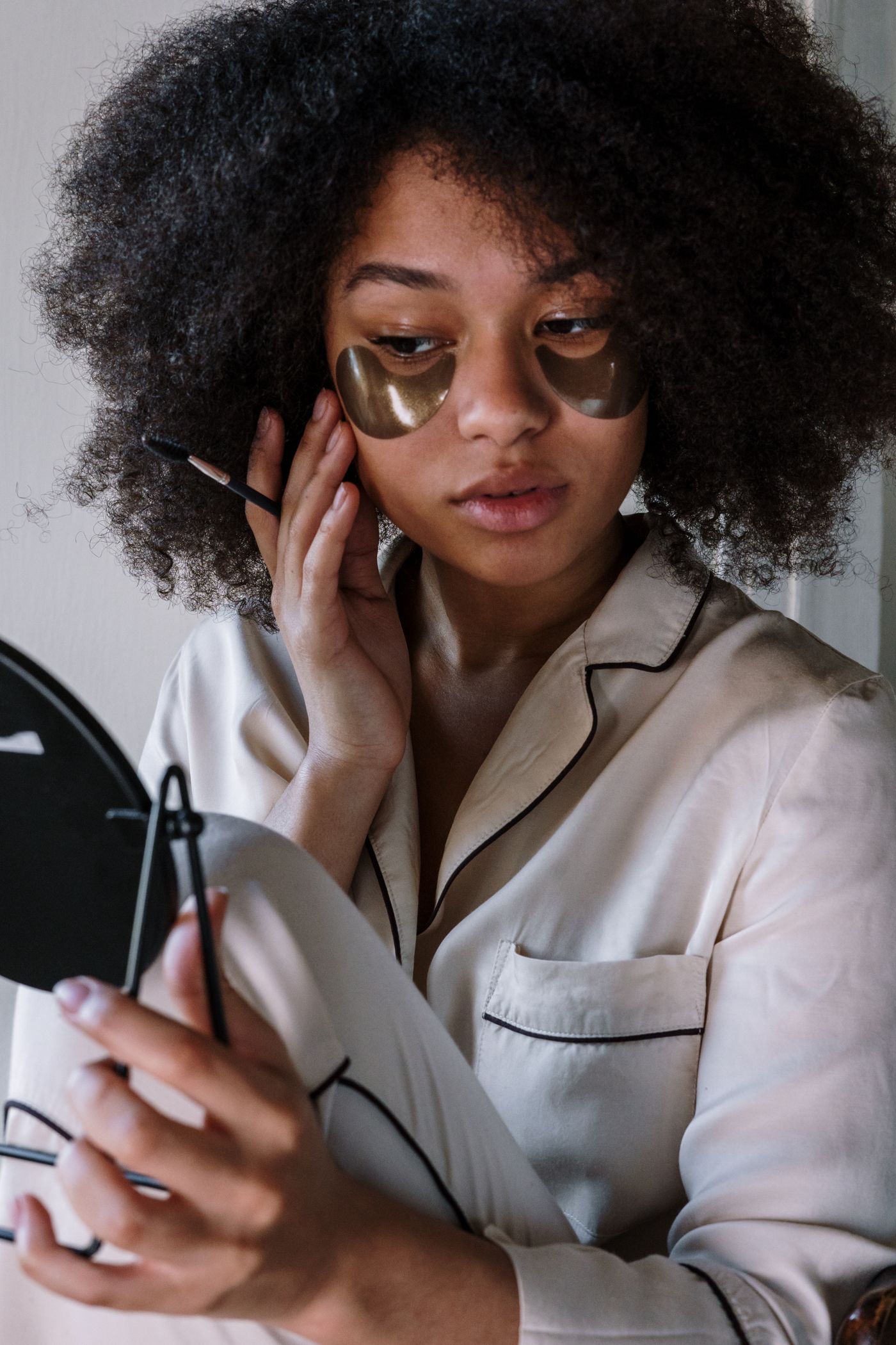 Black woman with voluminous natural curly hair