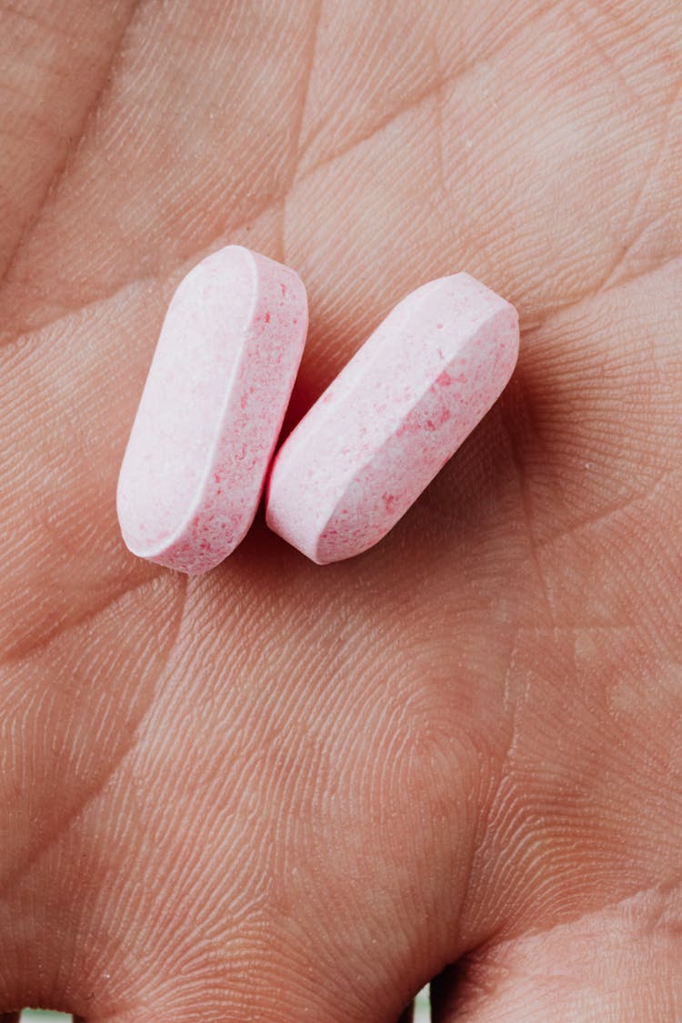 Close-up View Of Two Medicinal Tablets