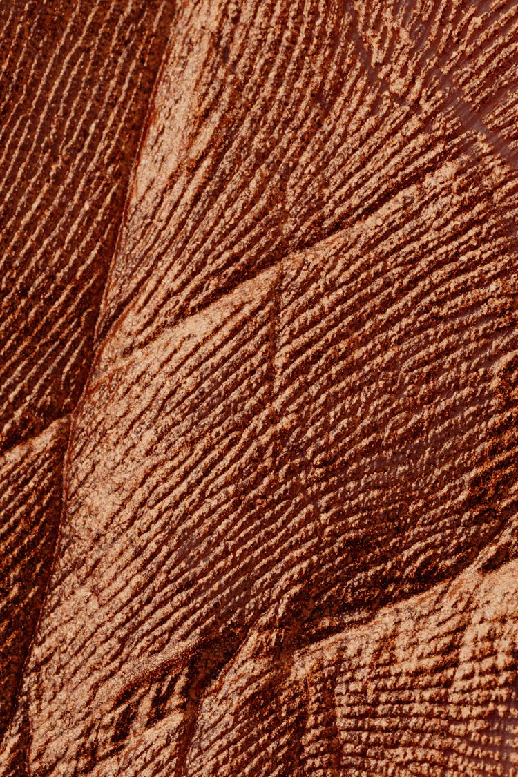 Textured Cracked Background Of Brown Color