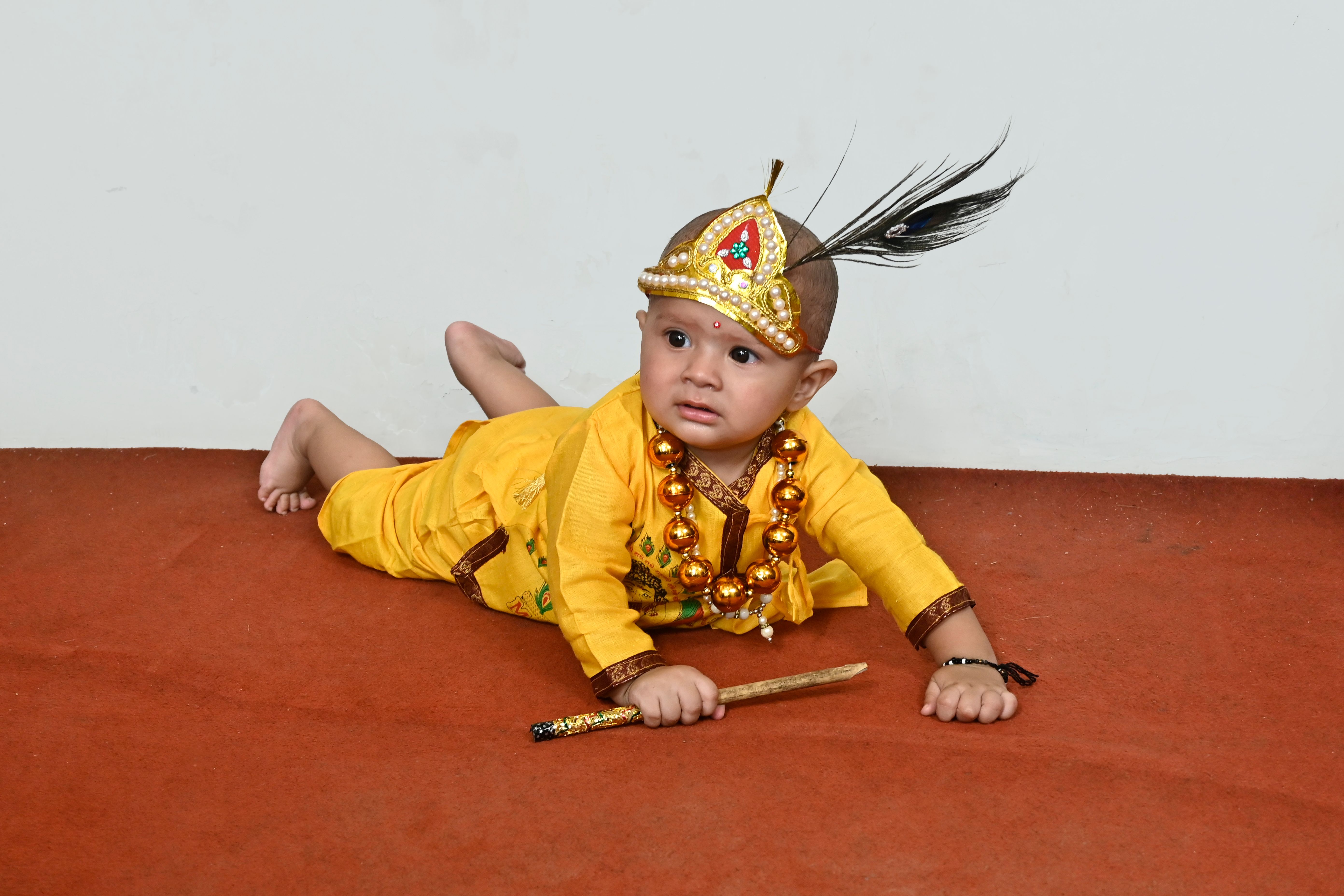 Cute Baby Dressed as Lord Krishna in Traditional Attire · Free Stock Photo