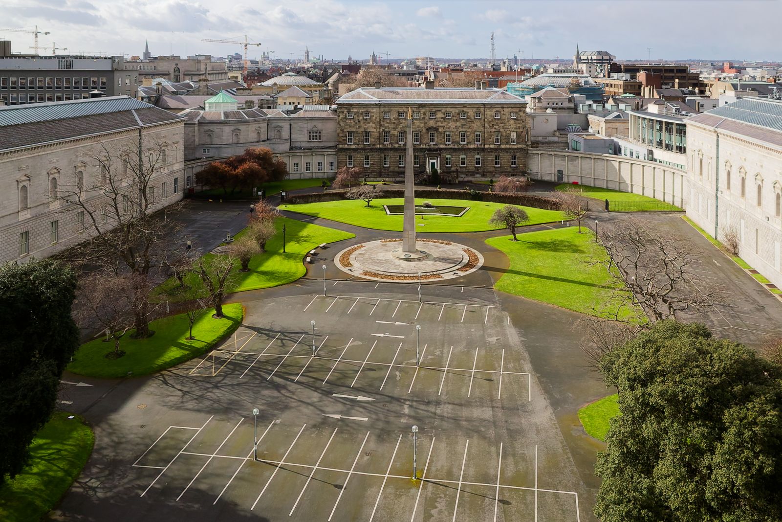 Aerial view of a historic courtyard with an obelisk in Dublin, Ireland, showcasing classic architecture and open space