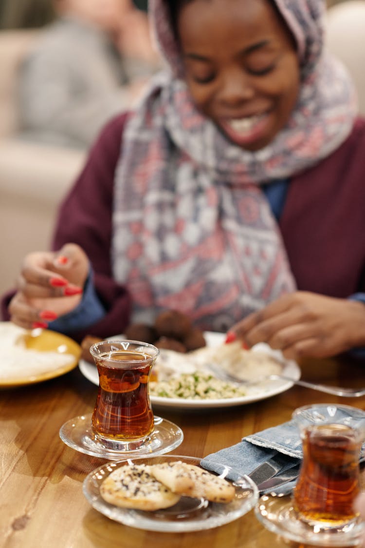 Muslim Woman In Restaurant