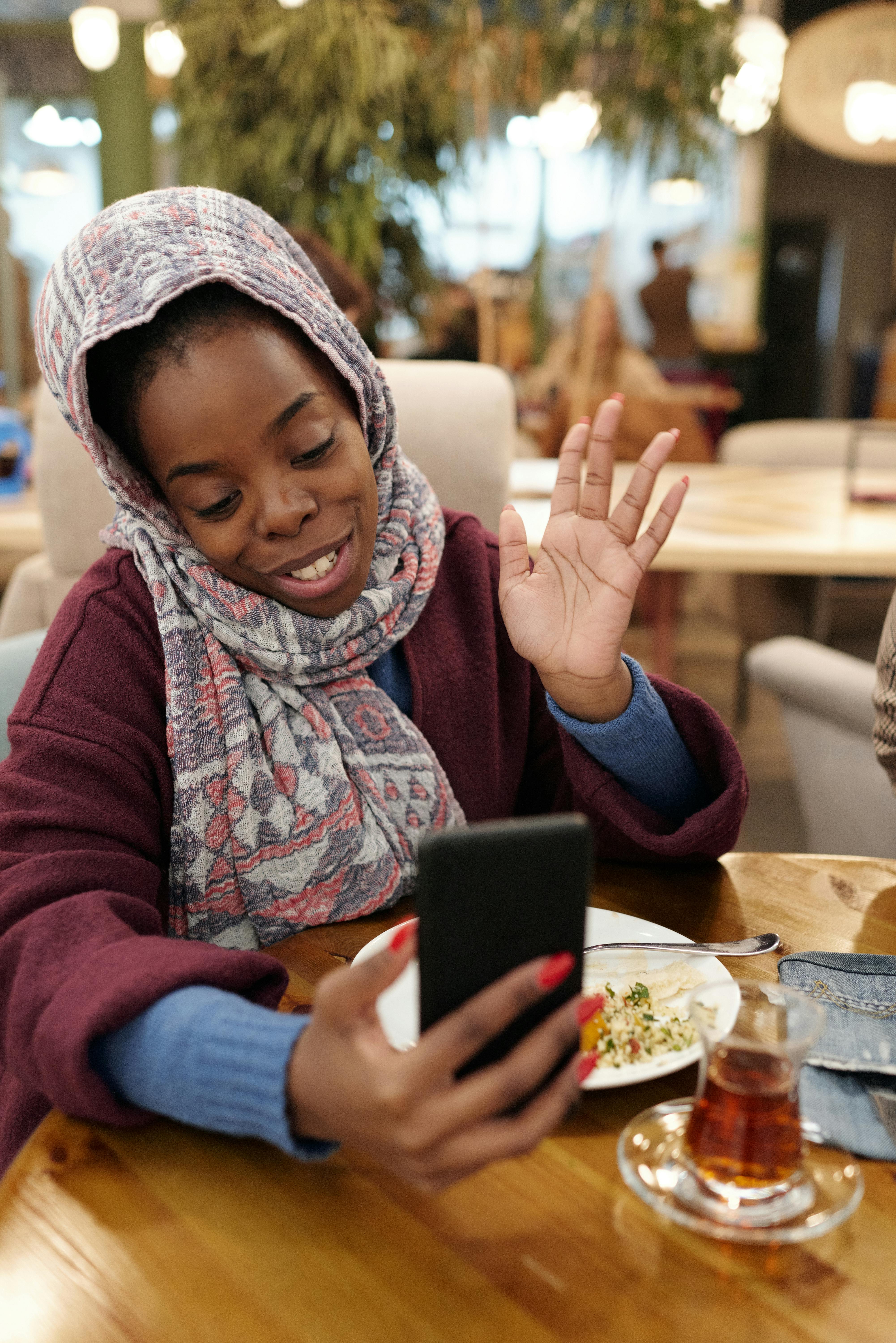 muslim woman using smartphone