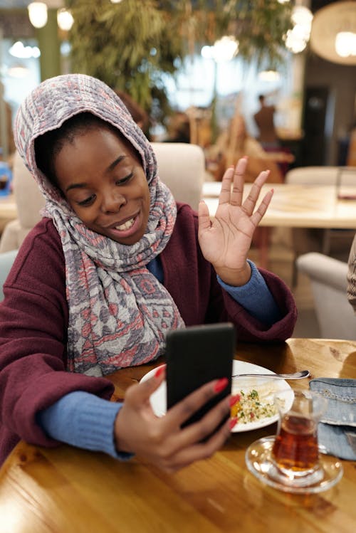 Muslim Woman Using Smartphone
