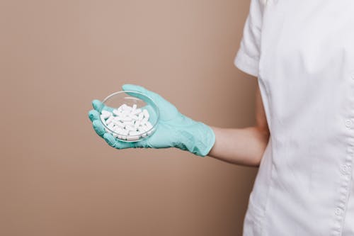 White Tablets on Petri Dish